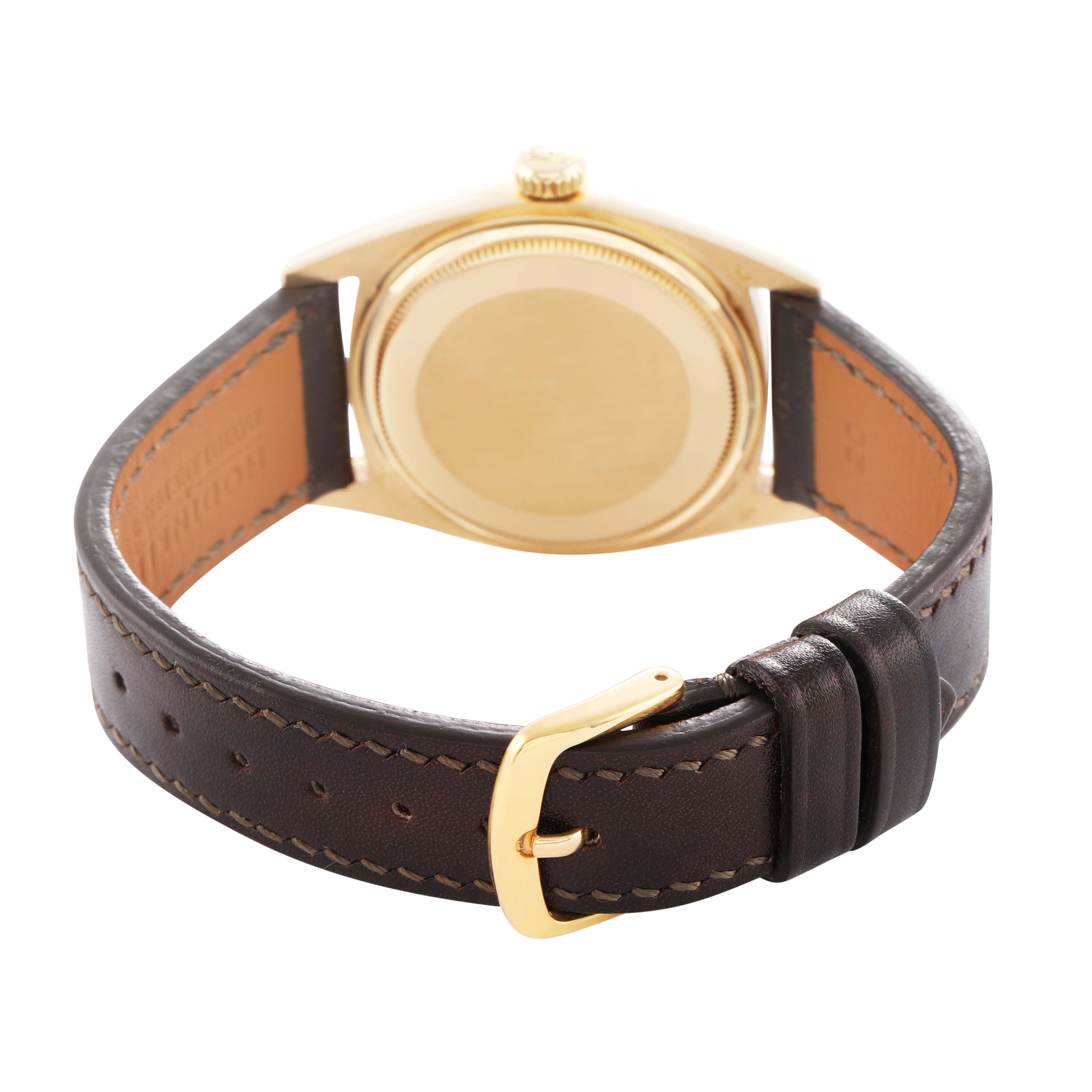 The Rolex President 18038 Men's Yellow Gold Champagne Dial model watch is shown from the back, highlighting its gold case and brown leather strap with a gold buckle.