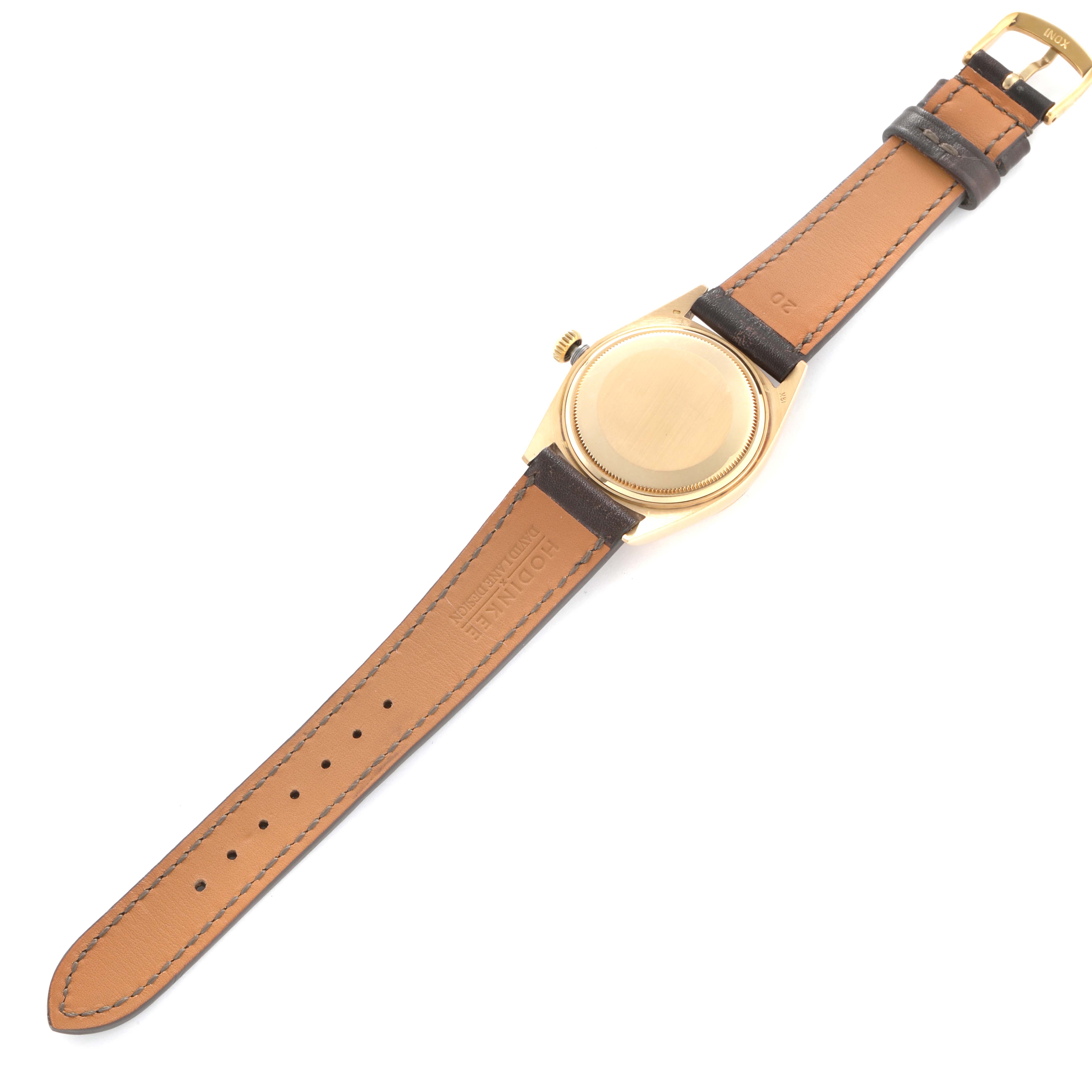 The image shows the back and strap of a Rolex President 18038 Men's Yellow Gold Champagne Dial model watch, with the watch laid flat.