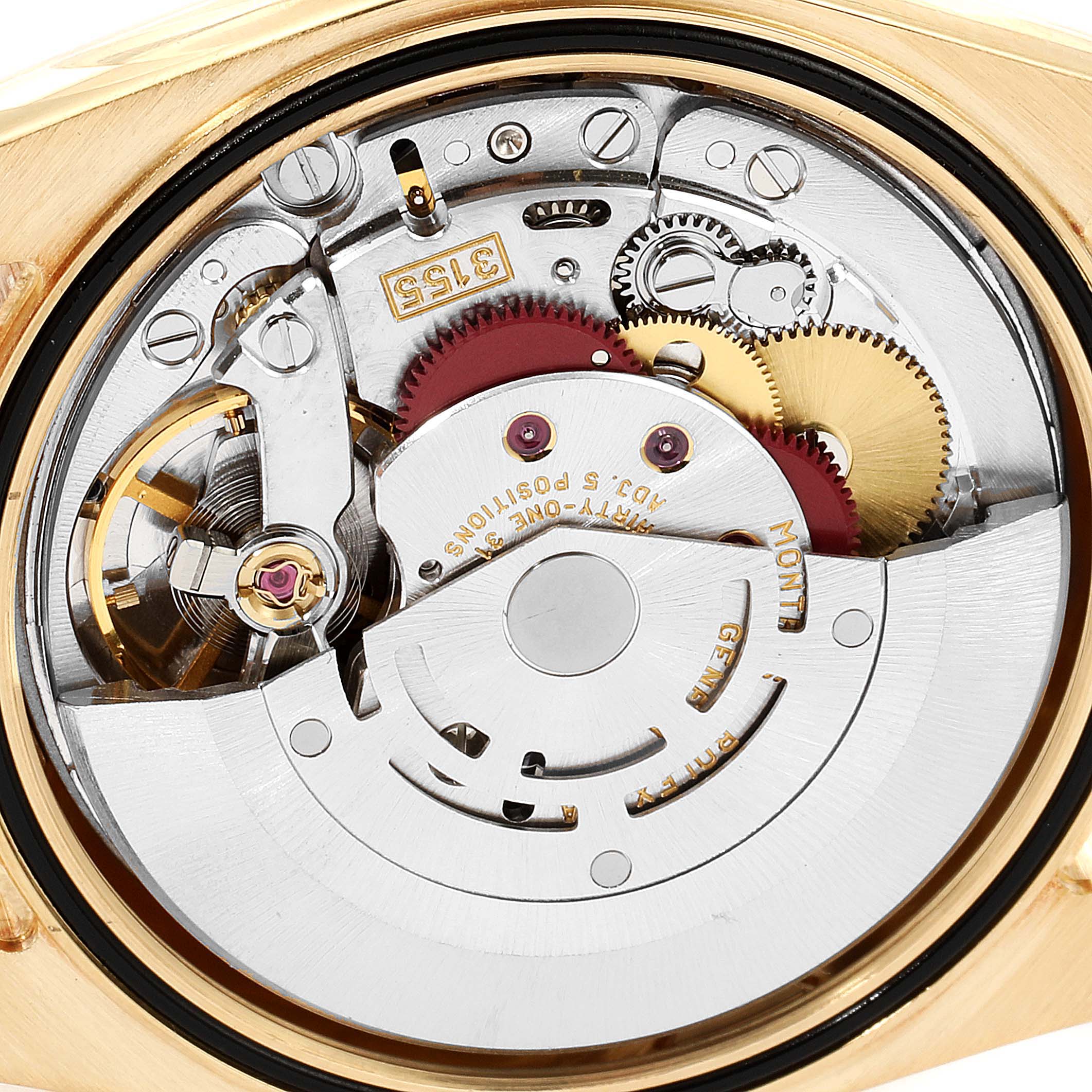 This image shows the detailed internal mechanics of a Rolex President 118338 Men
s Yellow Gold Silver Dial 118338 Men
s Yellow Gold Silver Dial model watch from a close-up angle.
