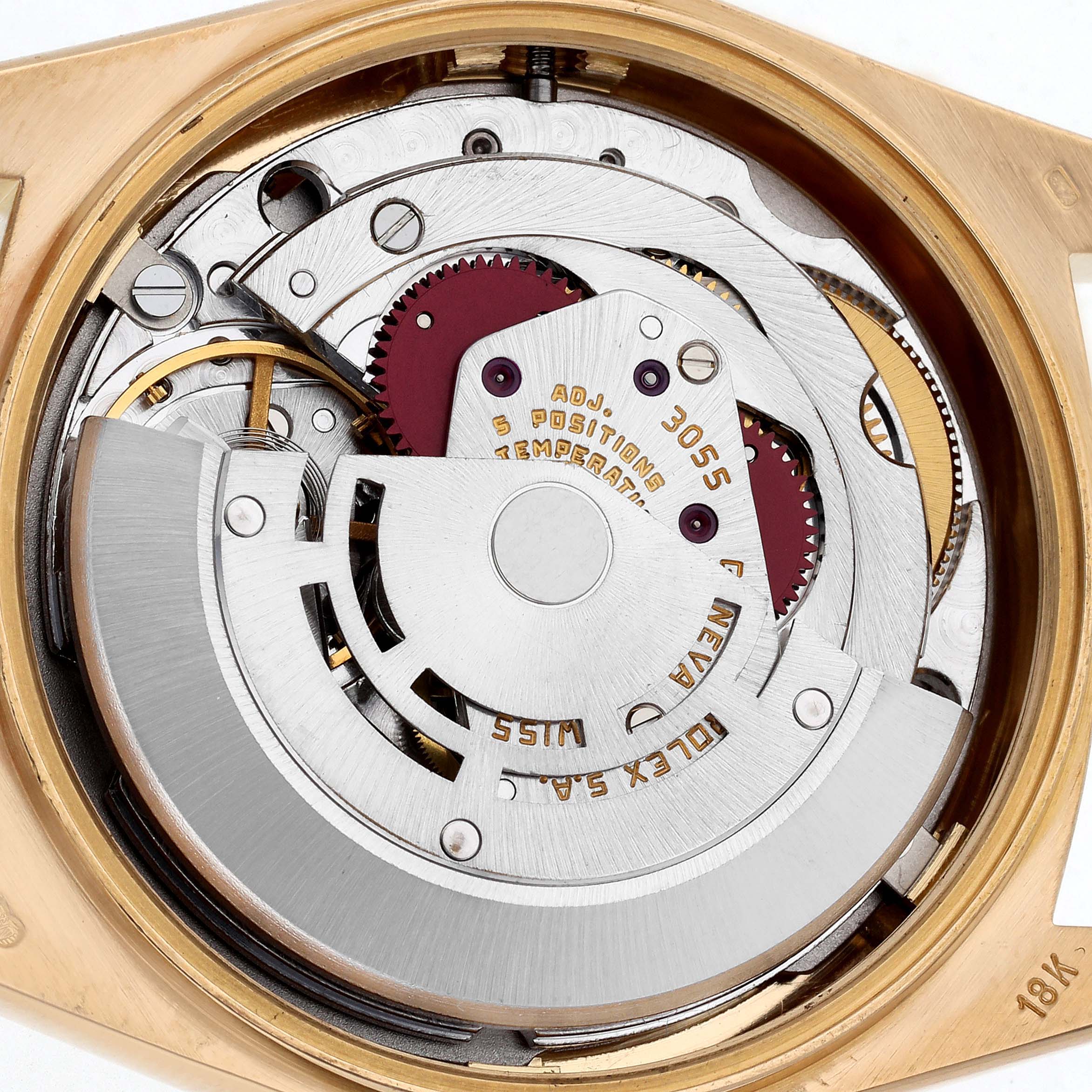 The image shows the open case back of a Rolex President 18038 Men's Yellow Gold White Dial model, displaying its intricate movement and rotor.