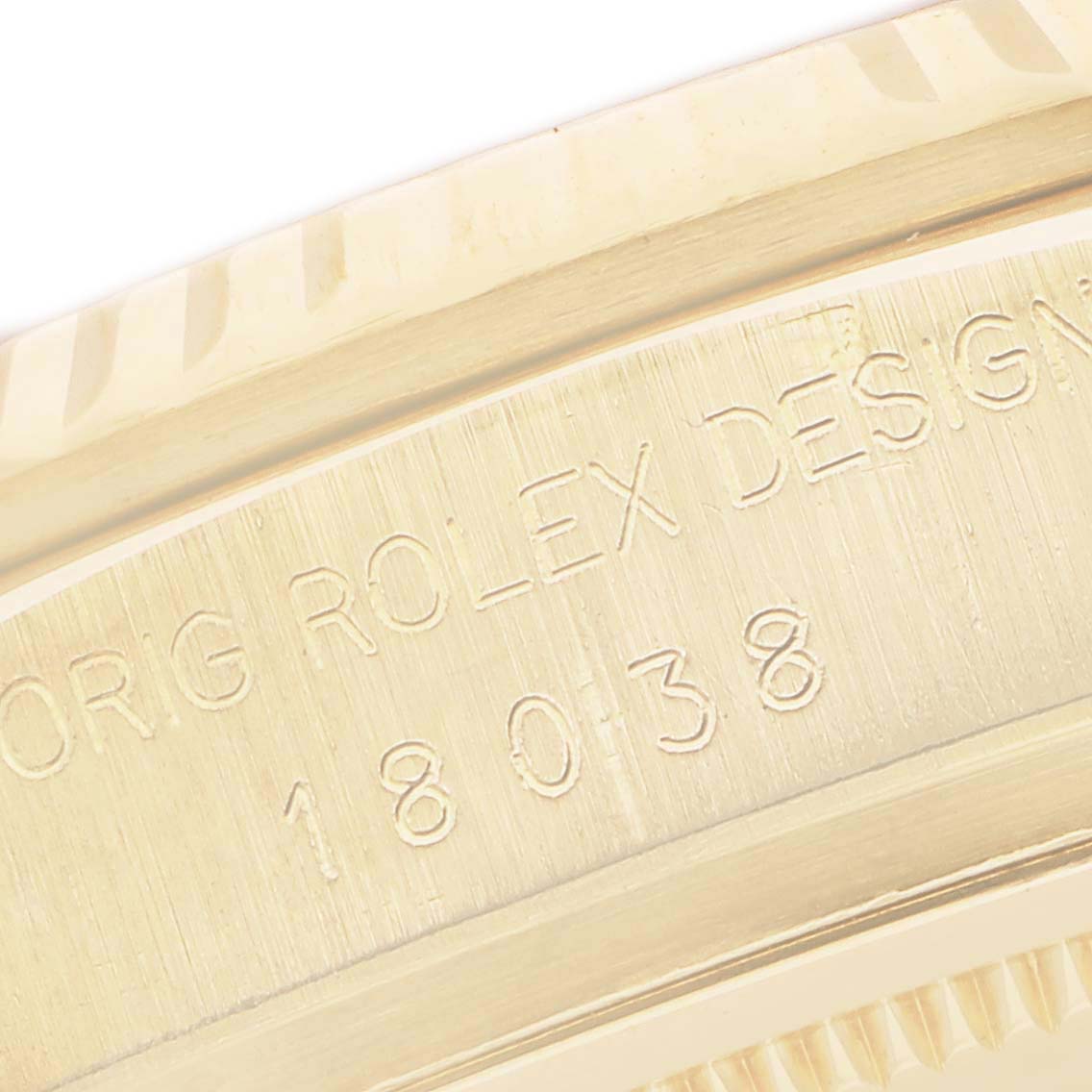 The image shows a close-up of the case engraving on a Rolex President 18038 Men's Yellow Gold White Dial model, highlighting the model number.