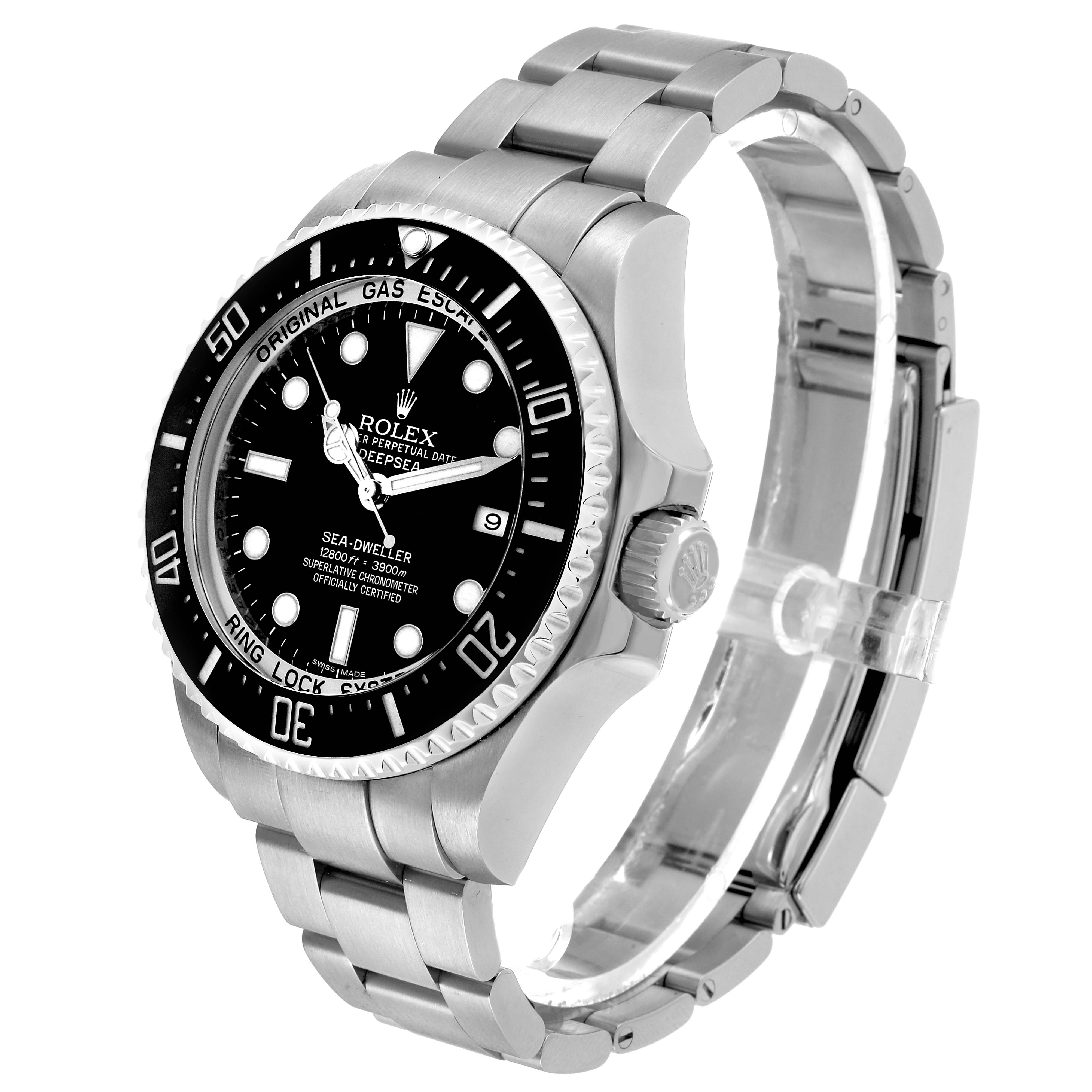 The image shows a Rolex Sea-Dweller, focusing on the face, bezel, crown, and partial bracelet at a three-quarter angle.