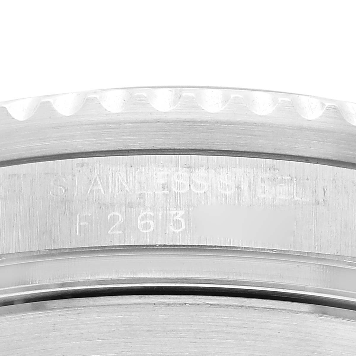 This image shows a close-up of the stainless steel case back edge of a Rolex Sea-Dweller 16600T Men's Stainless Steel Black Dial 16600T Men's Stainless Steel Black Dial watch.