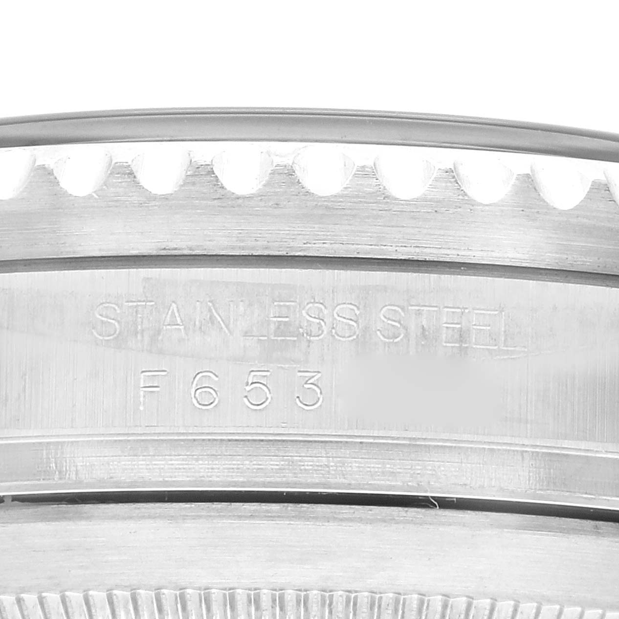 This image shows a close-up of the side engraving and bezel of a Rolex Sea-Dweller 16600T Men's Stainless Steel Black Dial 16600T Men's Stainless Steel Black Dial watch in stainless steel.