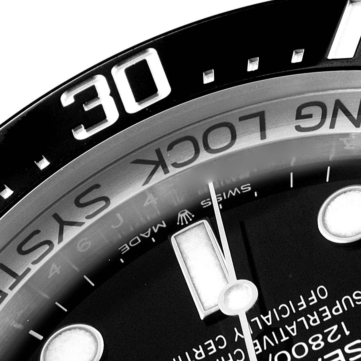 The image shows a close-up of the dial, minute hand, and bezel of a Rolex Sea-Dweller 126660 Men
s Stainless Steel Blue Dial 126660 Men
s Stainless Steel Blue Dial watch, highlighting "SWISS" and "30".