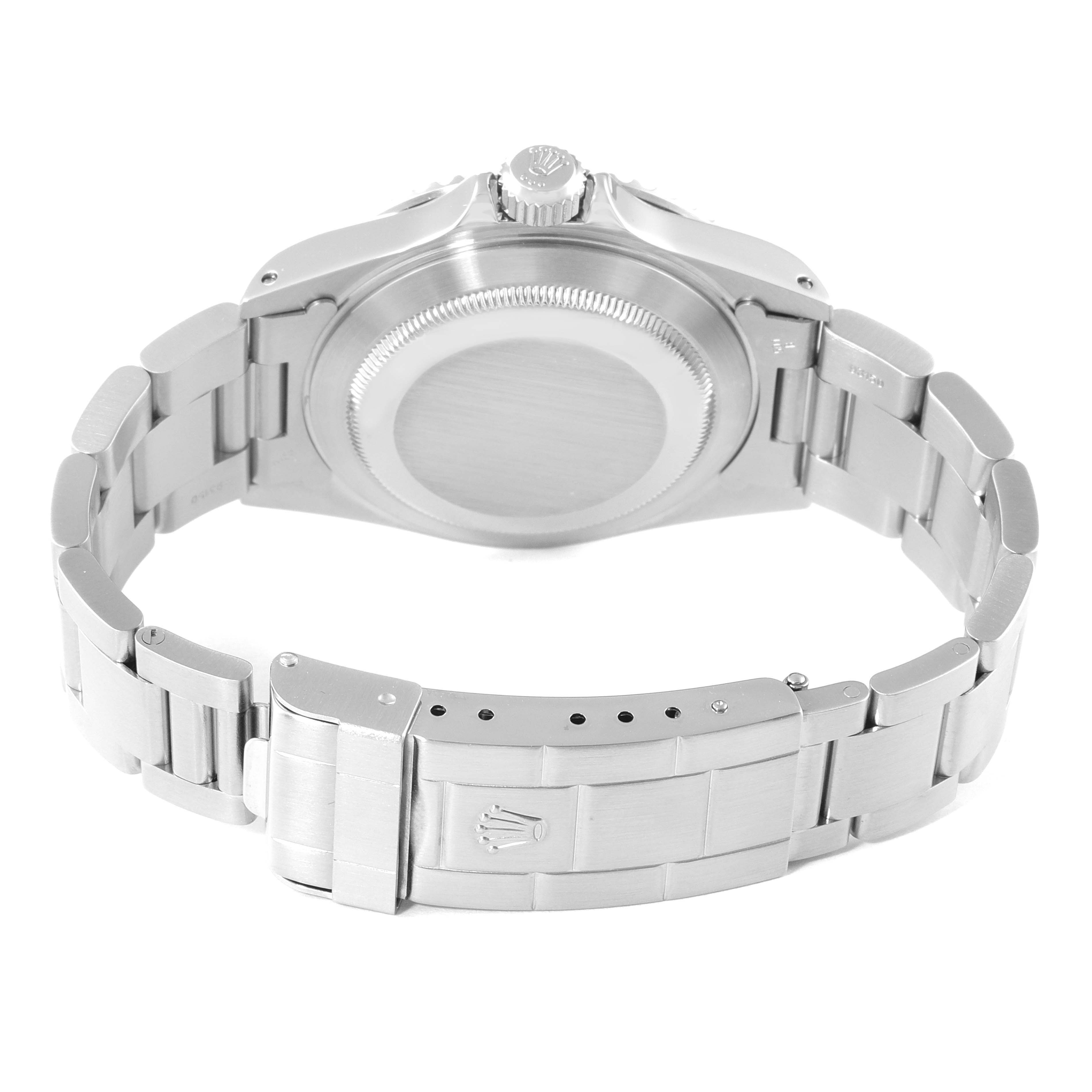 The image shows the back view of a Rolex Submariner 14060 Men
s Stainless Steel Black Dial 14060 Men
s Stainless Steel Black Dial watch, highlighting the case back, bracelet, and clasp.