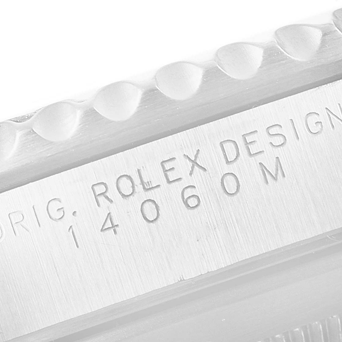 This close-up image shows the model number engraving on the case side of a Rolex Submariner 14060 Men
s Stainless Steel Black Dial 14060 Men
s Stainless Steel Black Dial watch.