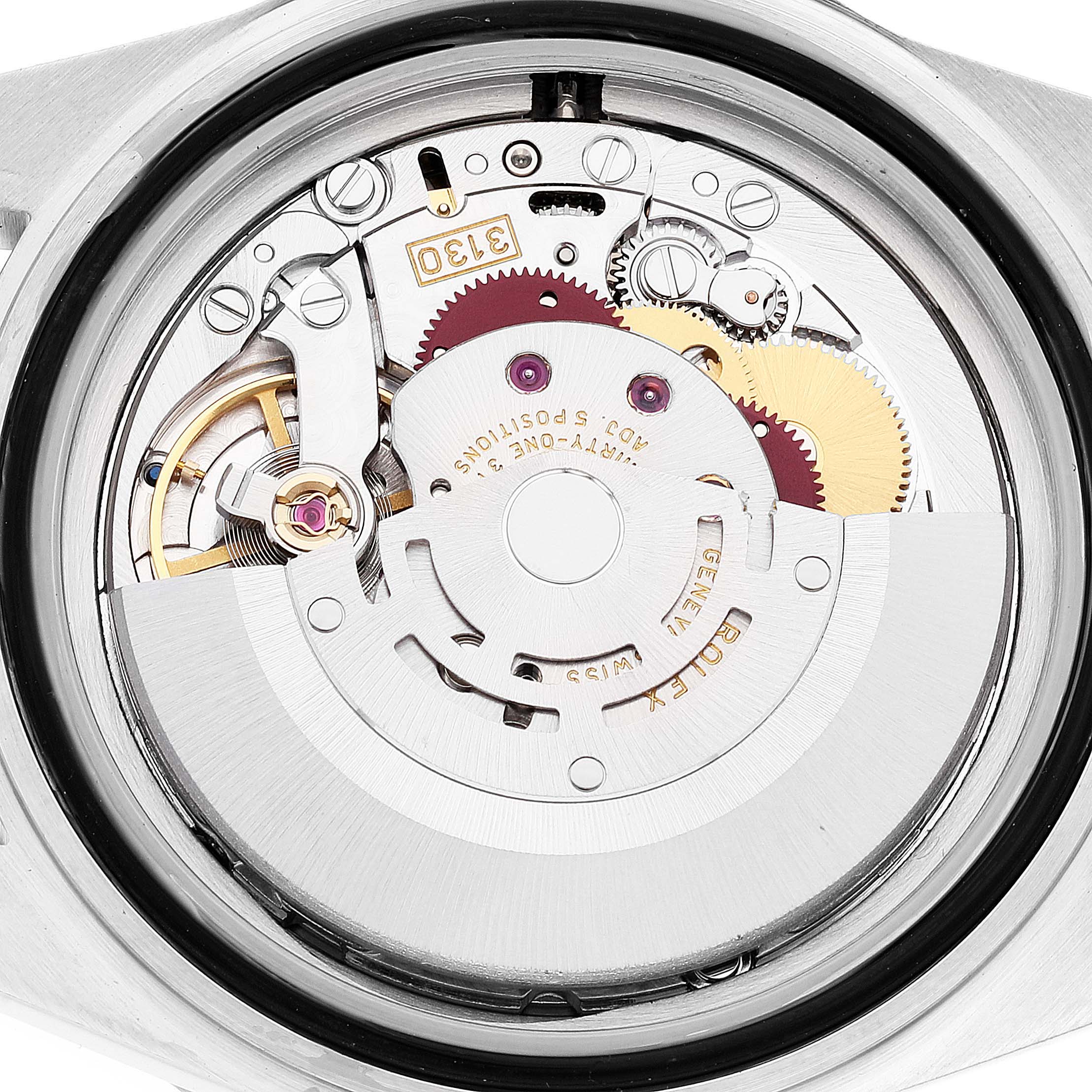 This image shows the internal mechanism of a Rolex Submariner 14060 Men
s Stainless Steel Black Dial 14060 Men
s Stainless Steel Black Dial watch, highlighting gears and the rotor.