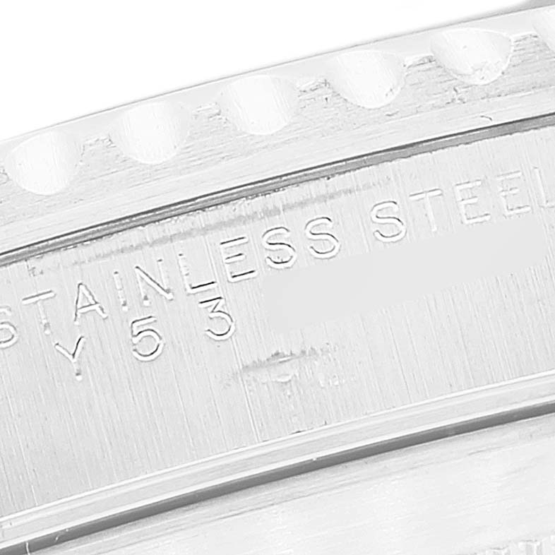 This image displays a close-up of the side engraving on a Rolex Submariner 14060 Men
s Stainless Steel Black Dial 14060 Men
s Stainless Steel Black Dial watch, highlighting the "STAINLESS STEEL" text.