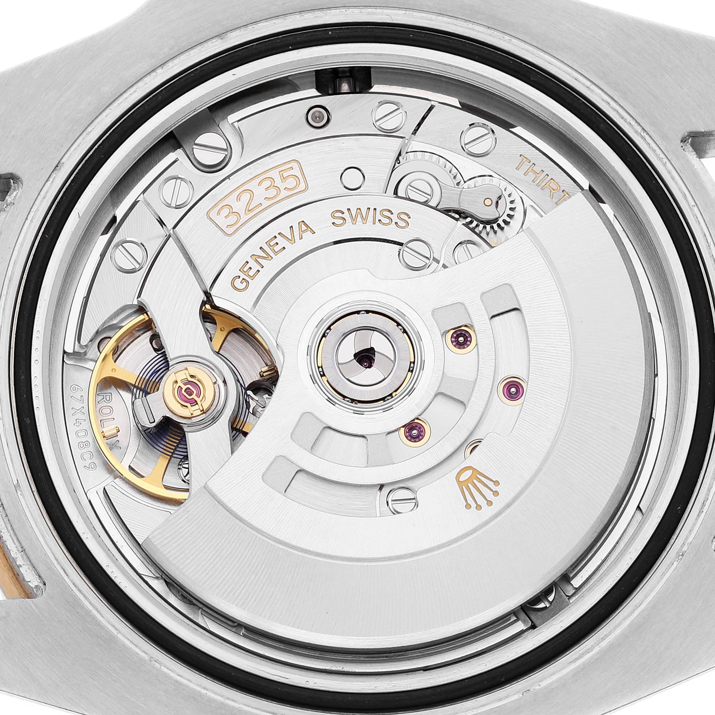 This image shows the back view of the Rolex Submariner 126613 Men's Steel and Gold (two tone) Blue Dial 126613 Men's Steel and Gold (two tone) Blue Dial's movement, specifically the Caliber 3235.