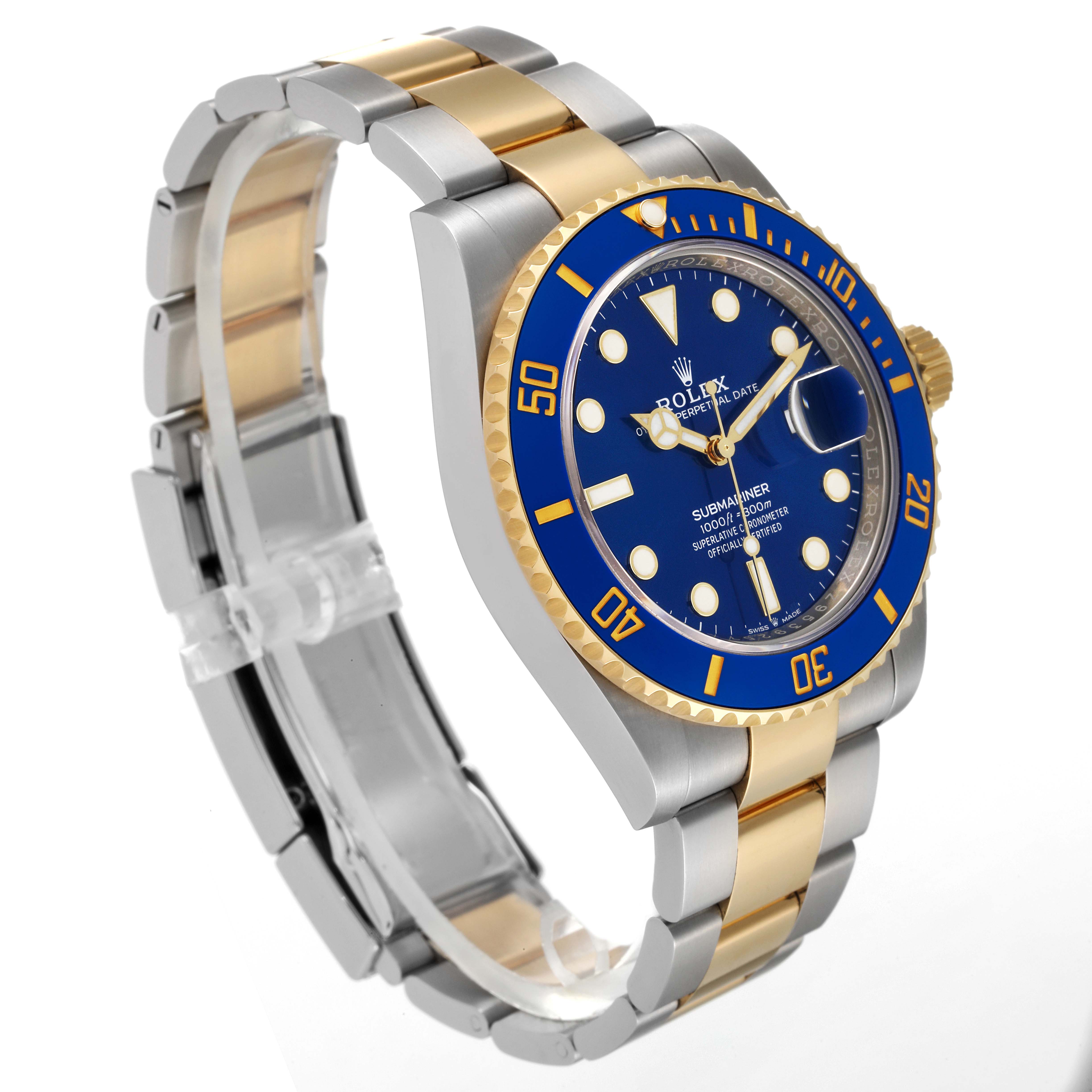 The image shows a Rolex Submariner 126613 Men's Steel and Gold (two tone) Blue Dial 126613 Men's Steel and Gold (two tone) Blue Dial watch at a three-quarter angle, highlighting its blue dial, bezel, and two-tone bracelet.