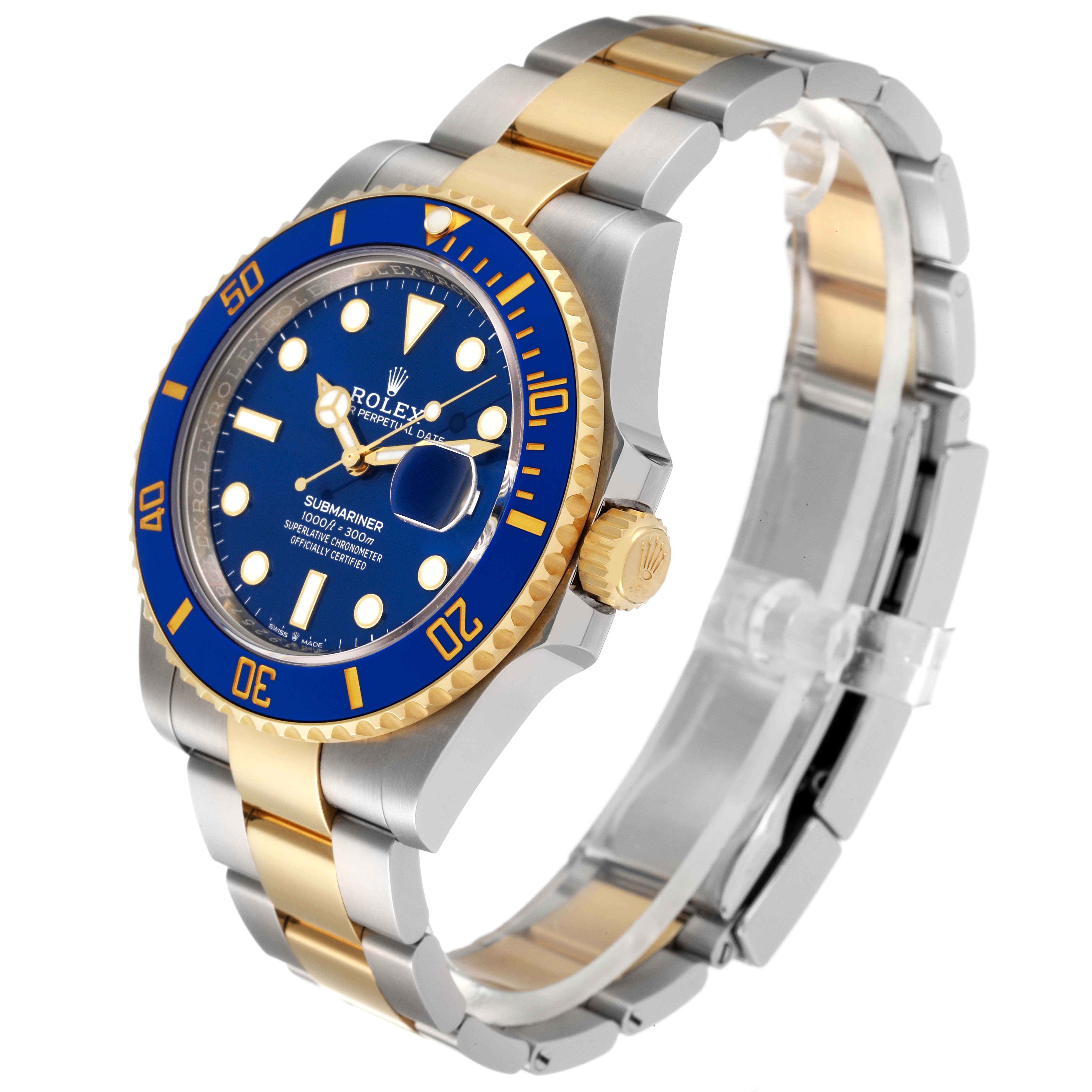 The image shows a Rolex Submariner 126613 Men's Steel and Gold (two tone) Blue Dial 126613 Men's Steel and Gold (two tone) Blue Dial watch at a slight angle, highlighting the blue dial, bezel, and the two-tone gold and steel bracelet.