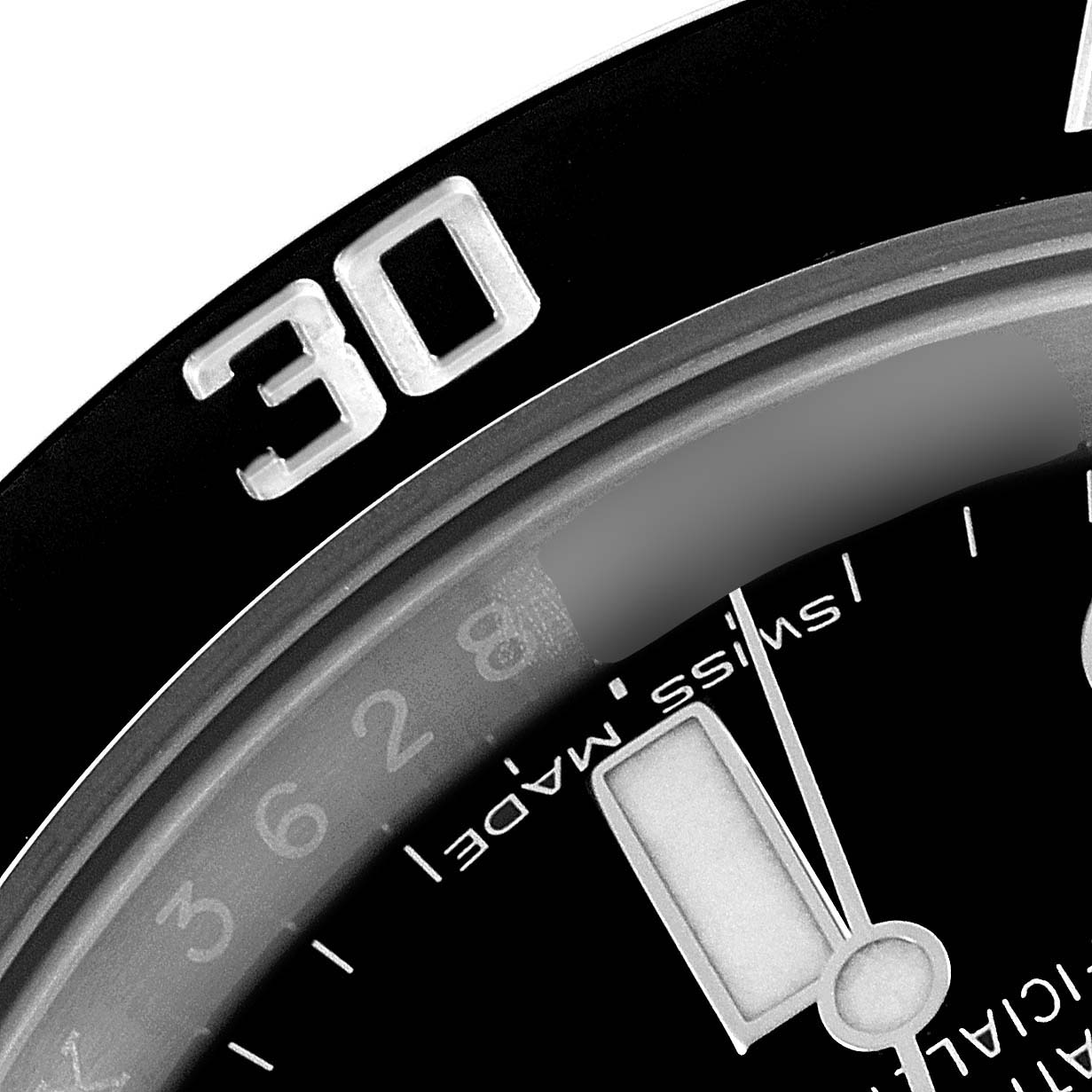 This close-up image shows the bezel and part of the dial of a Rolex Submariner 116610 Men
s Stainless Steel Black Dial 116610 Men
s Stainless Steel Black Dial watch, highlighting the number "30" and the "Swiss Made" text.
