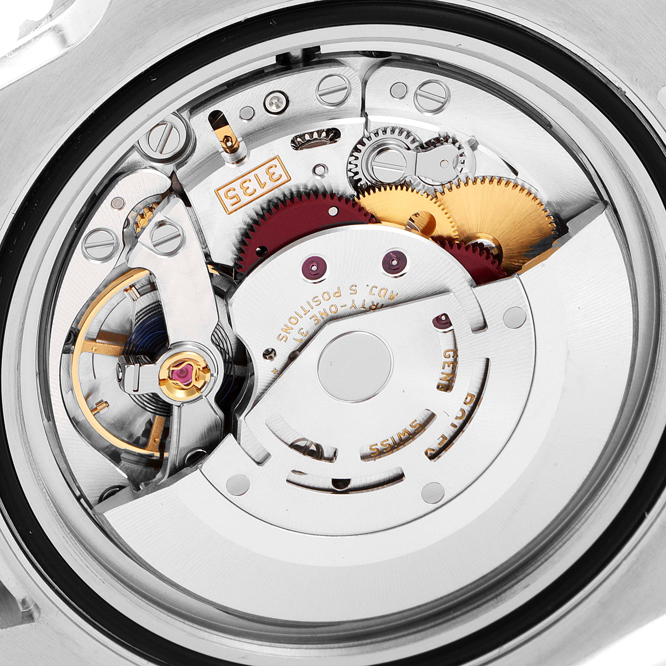 This image shows the intricate mechanical movement of a Rolex Submariner 116610 Men
s Stainless Steel Black Dial 116610 Men
s Stainless Steel Black Dial watch from a back angle.