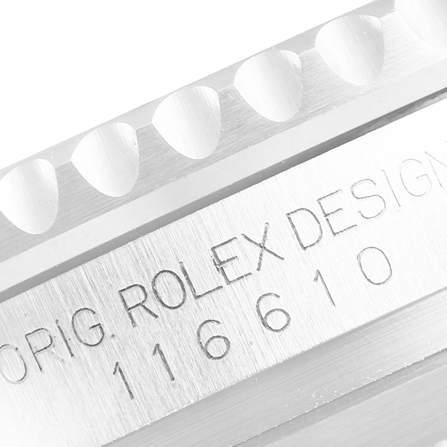 The image shows a close-up of the Rolex Submariner 116610 Men
s Stainless Steel Black Dial 116610 Men
s Stainless Steel Black Dial
s case side, focusing on the engraved model number, 116610.