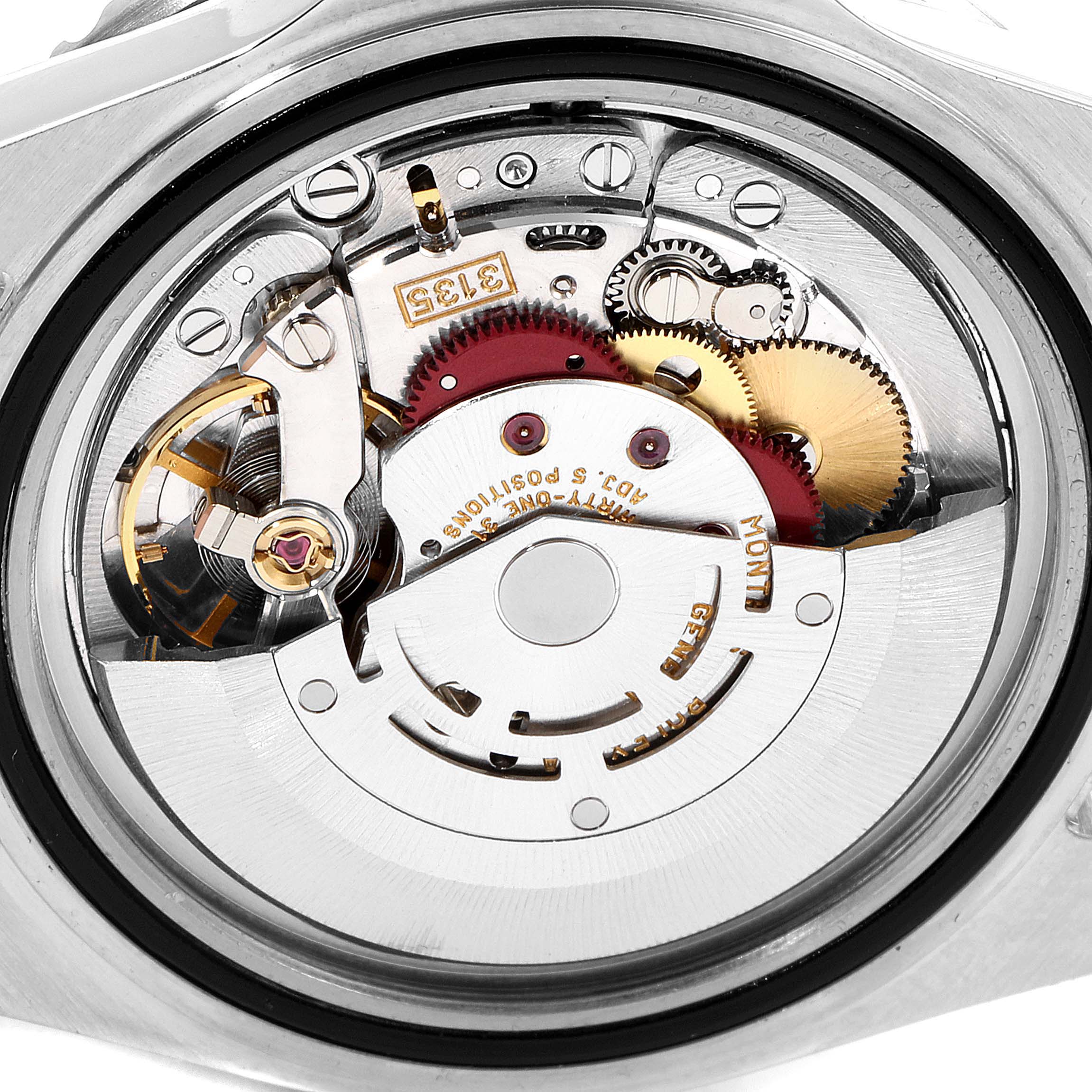 This image shows the intricate internal movement components of the Rolex Submariner 16610 Men
s Stainless Steel Black Dial 16610 Men
s Stainless Steel Black Dial watch from a close-up rear view.