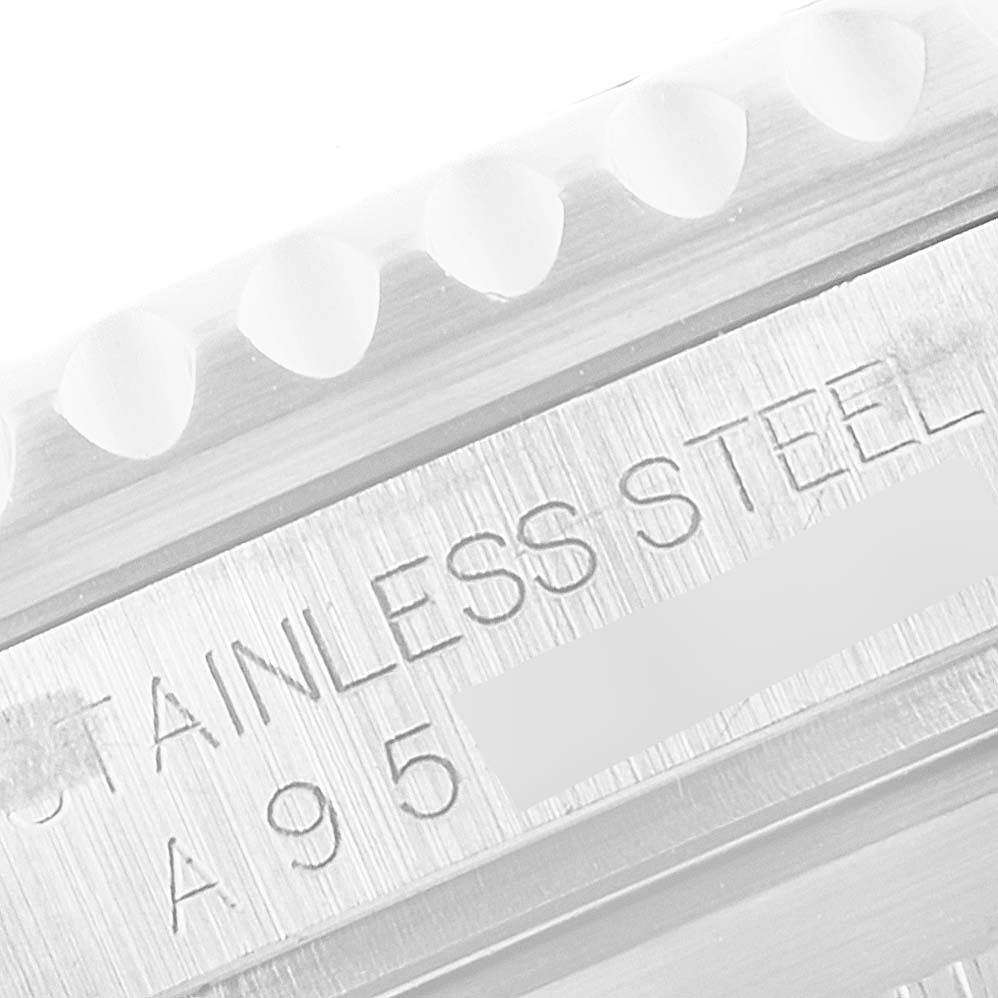 This image shows a close-up of the case side and bezel edge of a Rolex Submariner 16610 Men
s Stainless Steel Black Dial 16610 Men
s Stainless Steel Black Dial, highlighting the "stainless steel" engraving.