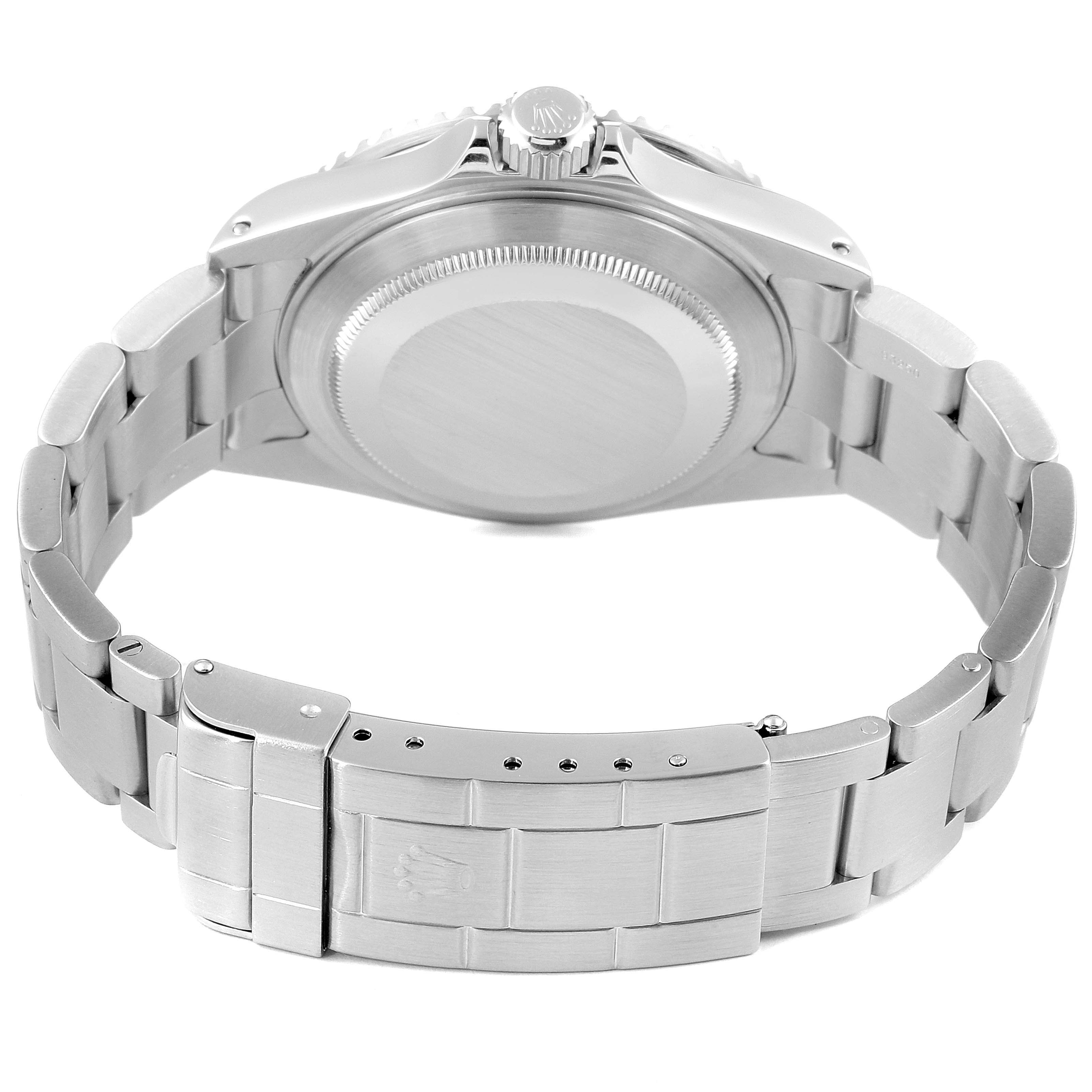 This image shows the back view of the Rolex Submariner 16610 Men
s Stainless Steel Black Dial 16610 Men
s Stainless Steel Black Dial watch, highlighting the case back and the stainless steel bracelet with a clasp.