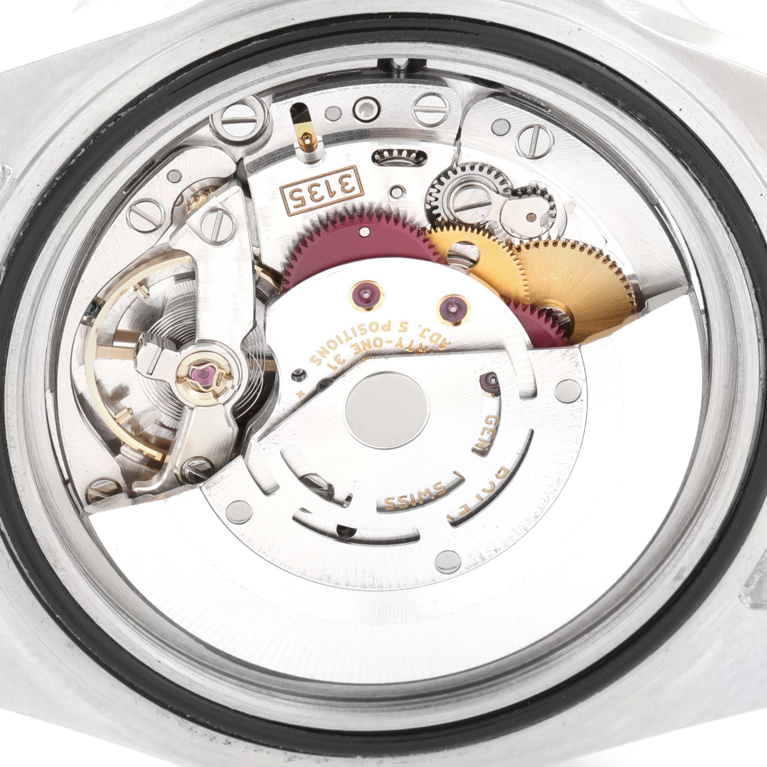 The image shows the internal mechanical movement of a Rolex Submariner 16610 Men
s Stainless Steel Black Dial 16610 Men
s Stainless Steel Black Dial watch, viewed from the back at a straight angle.