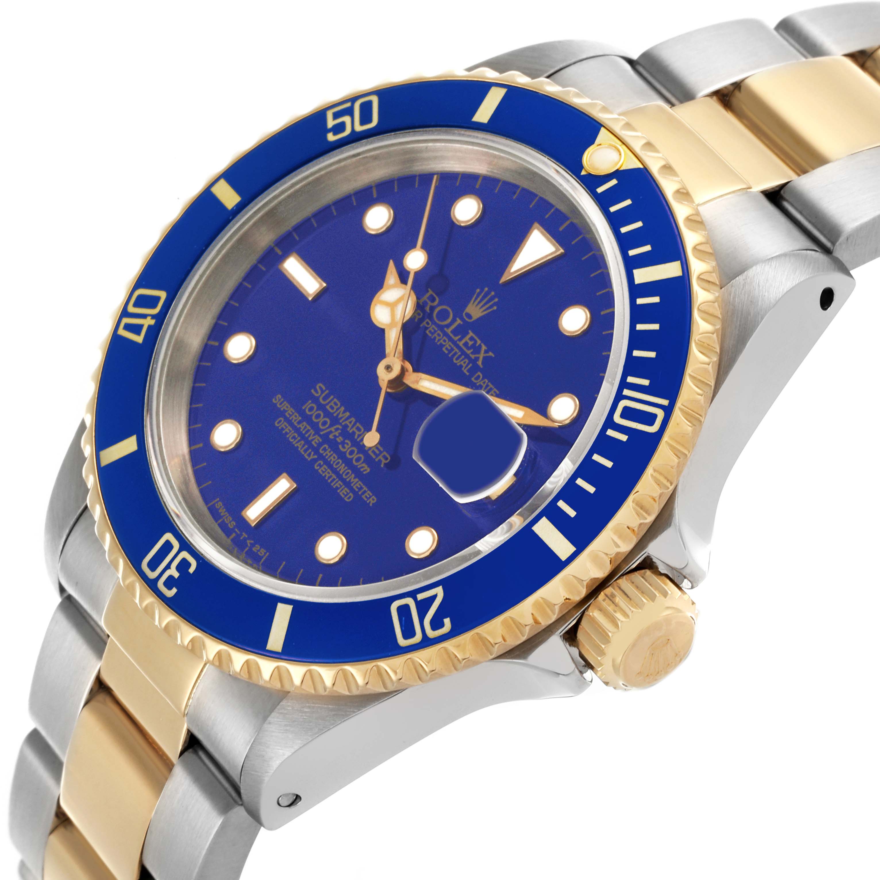 The Rolex Submariner 16613 Men's Steel and Gold (two tone) Blue Dial 16613 Men's Steel and Gold (two tone) Blue Dial watch is shown at an angle highlighting its blue and gold bezel, dial, crown, and two-tone bracelet.