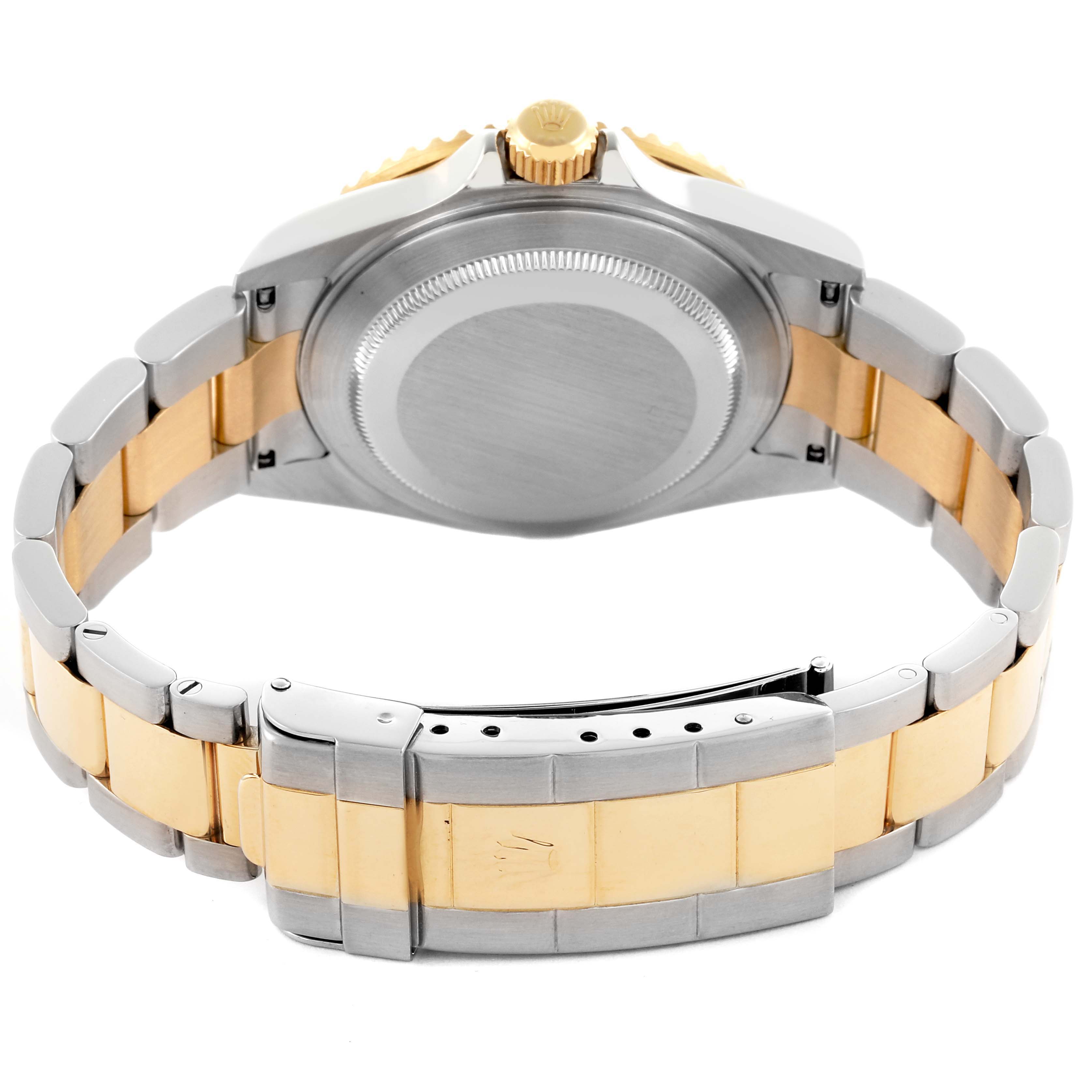 The image shows the back and side view of a Rolex Submariner 16613 Men's Steel and Gold (two tone) Black Dial 16613 Men's Steel and Gold (two tone) Black Dial, highlighting the watch's case, crown, and bracelet.