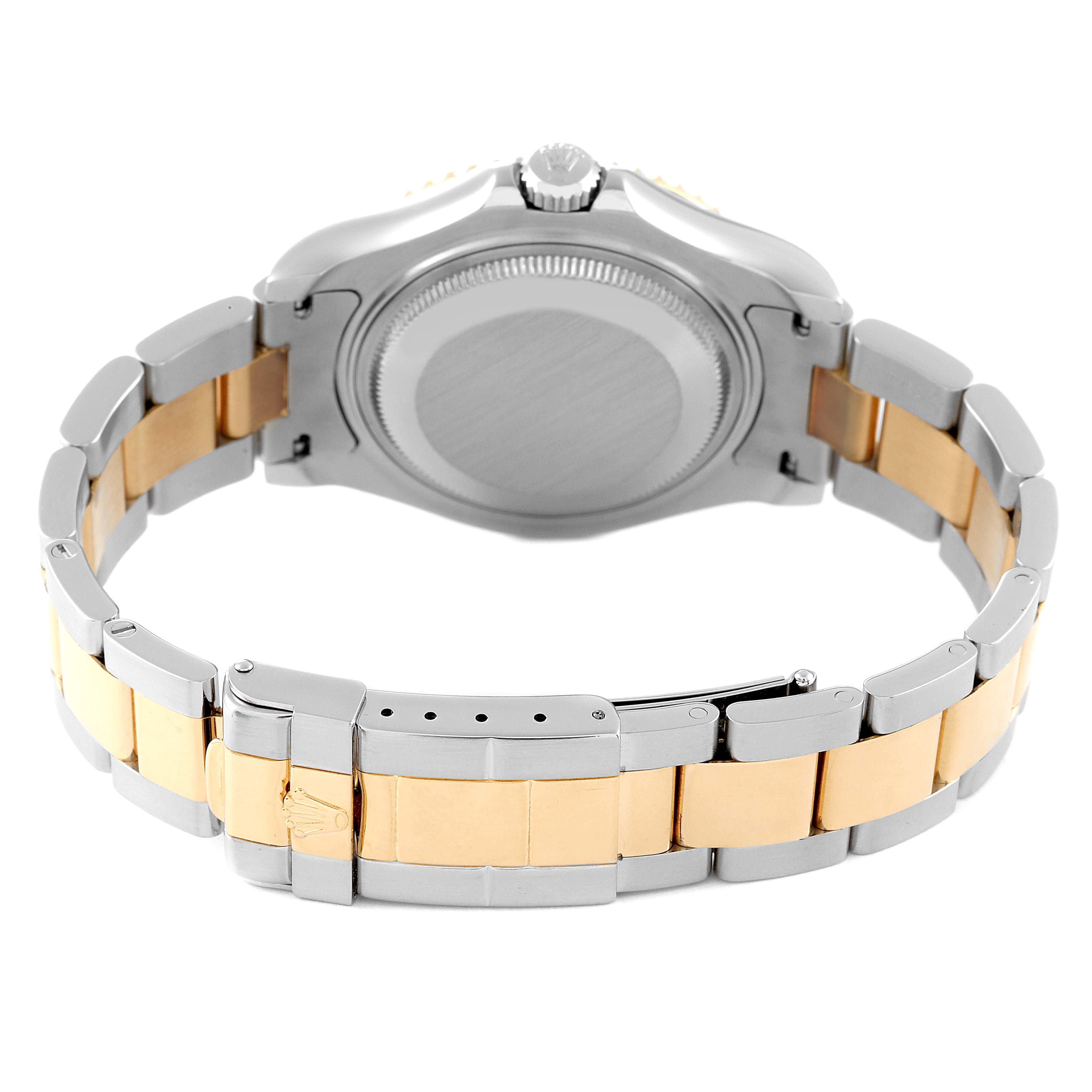 This image shows the back view of a Rolex Yacht-Master 68623 Men
s Steel and Gold (two tone) Blue Dial 68623 Men
s Steel and Gold (two tone) Blue Dial watch focusing on the case back and two-tone bracelet.