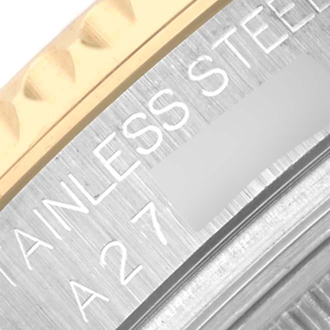 The image shows a close-up of the Rolex Yacht-Master 68623 Men's Steel and Gold (two tone) Champagne Dial 68623 Men's Steel and Gold (two tone) Champagne Dial's bezel, highlighting the stainless steel and gold detailing.