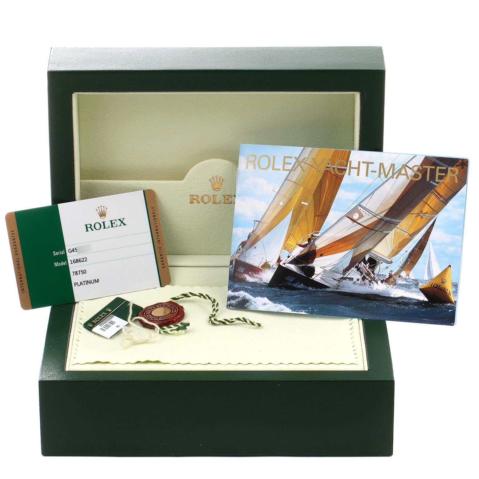 The photo shows a Rolex Yacht-Master 168622 Men
s Stainless Steel Silver Dial 168622 Men
s Stainless Steel Silver Dial watch box, an Best Quality
ity card, a booklet, a tag, and a seal, angled from the front.