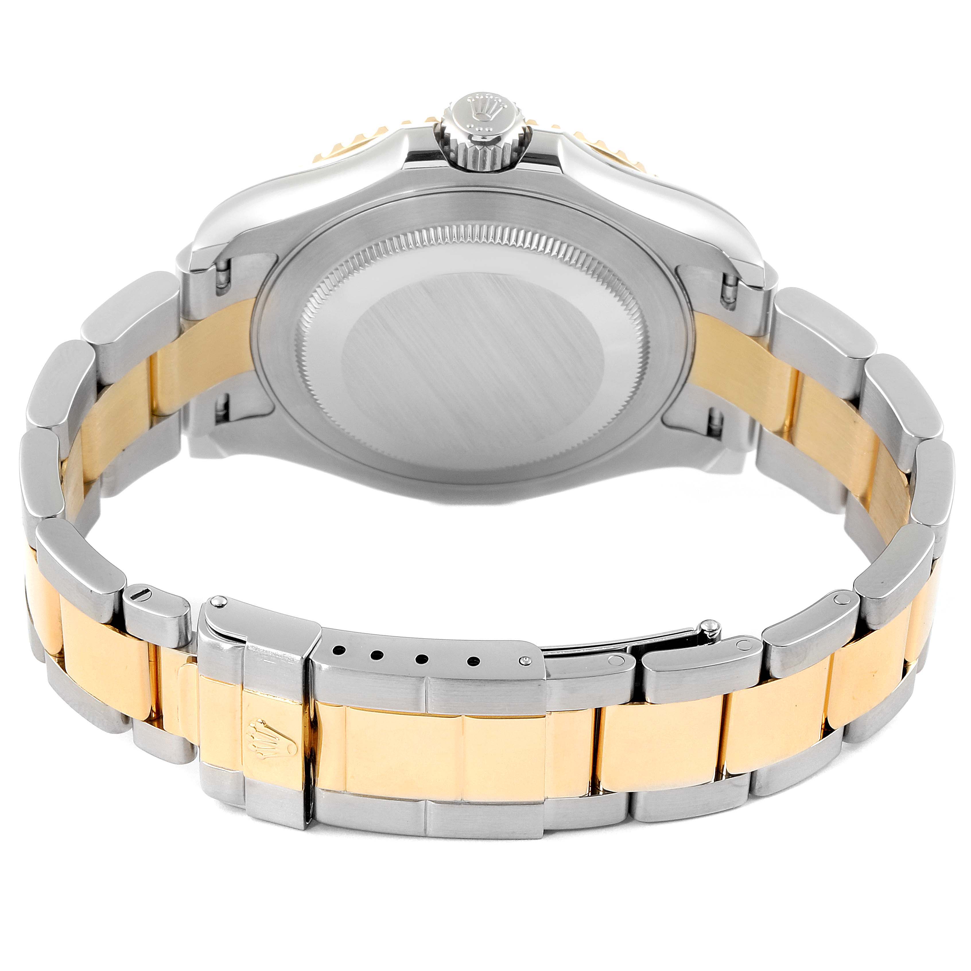 The image shows a rear view of the Rolex Yacht-Master 16623 Men's Steel and Gold (two tone) Blue Dial 16623 Men's Steel and Gold (two tone) Blue Dial watch, highlighting its case back, crown, and two-tone bracelet.