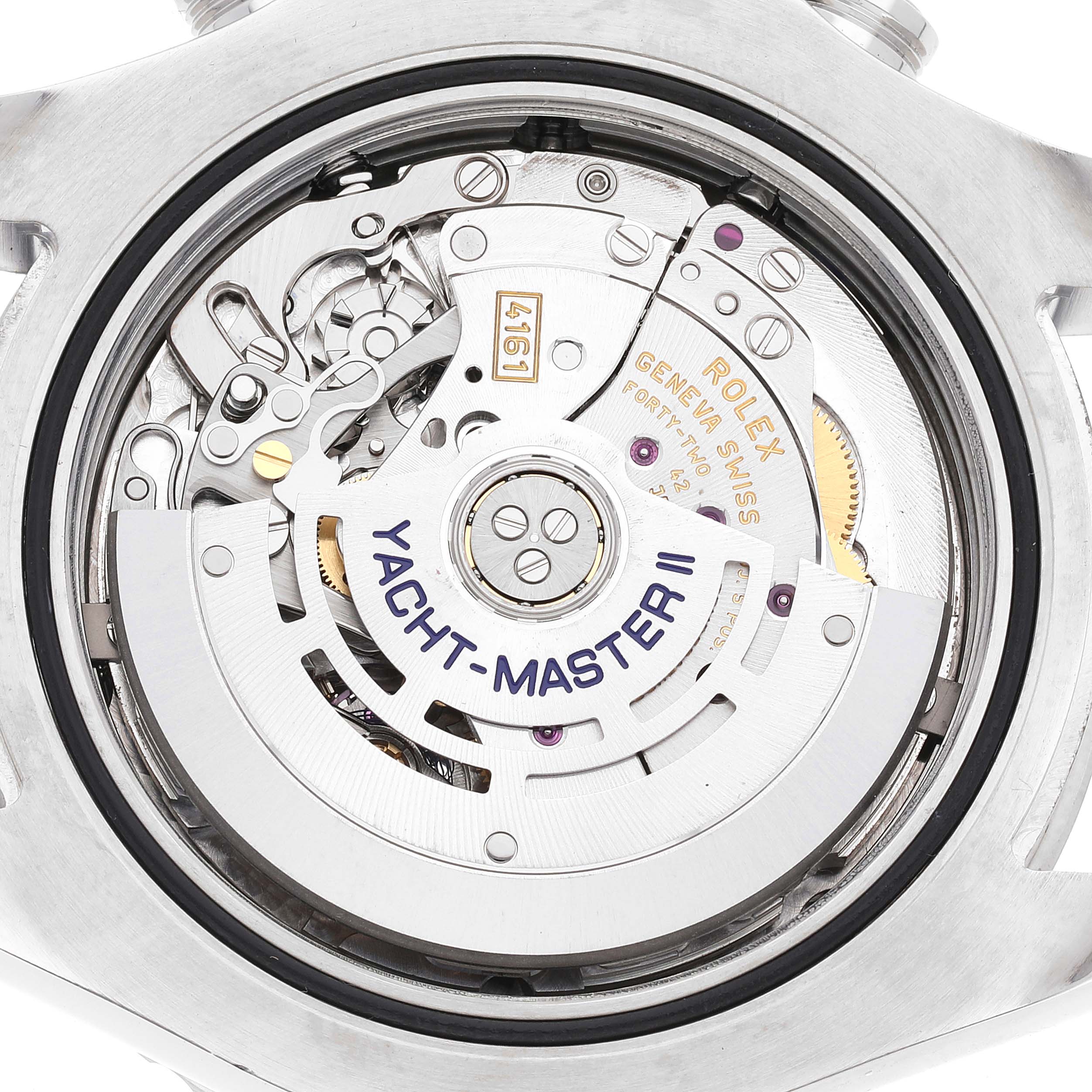 The image shows the case back and exposed movement of a Rolex Yacht-Master 116680 Men
s Stainless Steel White Dial 116680 Men
s Stainless Steel White Dial model watch.