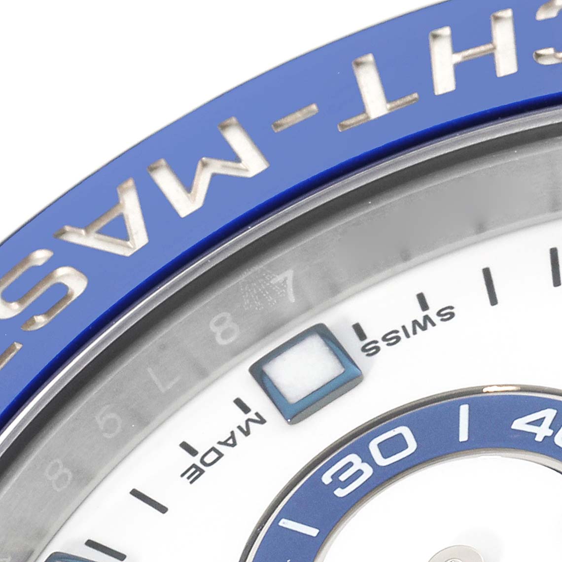 The image shows a close-up of the bezel, part of the face, and the "SWISS MADE" marking of the Rolex Yacht-Master 116680 Men
s Stainless Steel White Dial 116680 Men
s Stainless Steel White Dial watch.