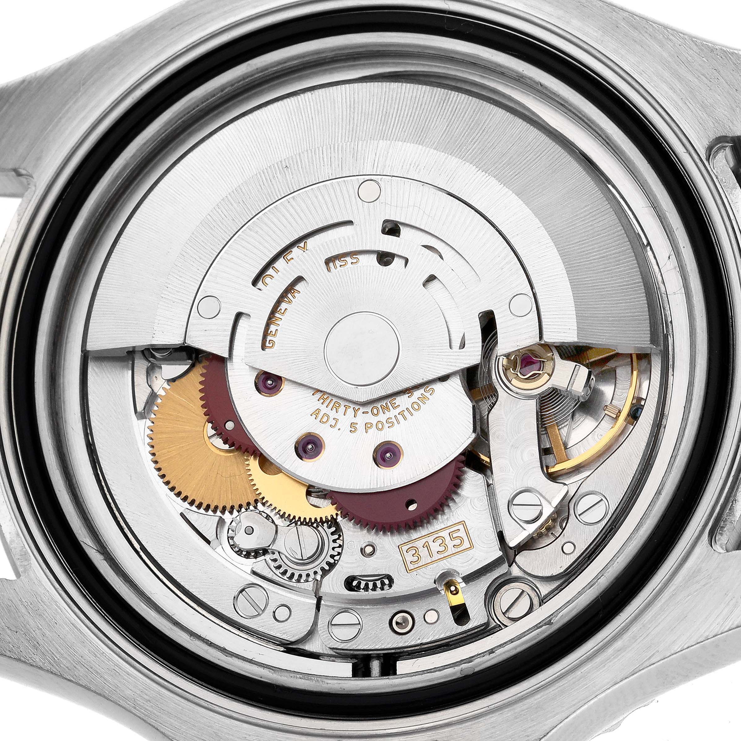 The image shows the movement of a Rolex Yacht-Master 16622 Men's Stainless Steel Silver Dial 16622 Men's Stainless Steel Silver Dial watch from a top-down angle, highlighting its intricate internal mechanisms.