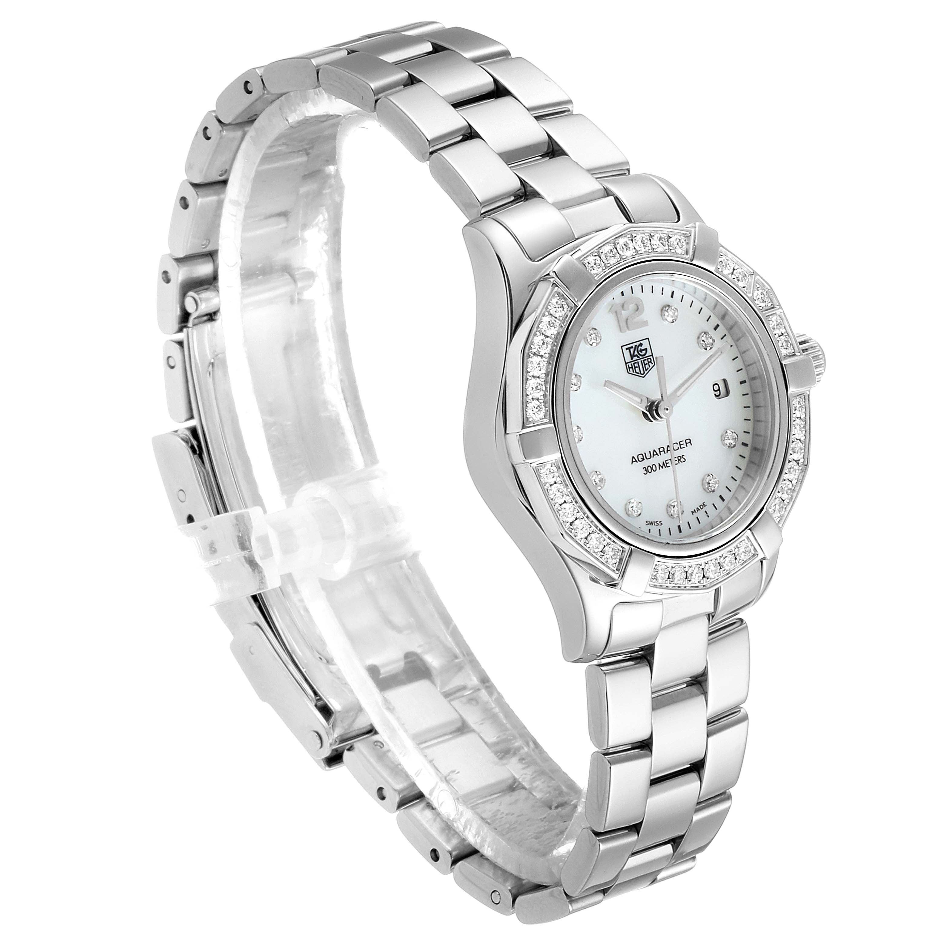 The Tag Heuer Aquaracer WAF1416.BA0824 Women
s Stainless Steel Mother of Pearl Dial WAF1416.BA0824 Women
s Stainless Steel Mother of Pearl Dial watch is shown at an angled view, displaying the dial, bracelet, and bezel.