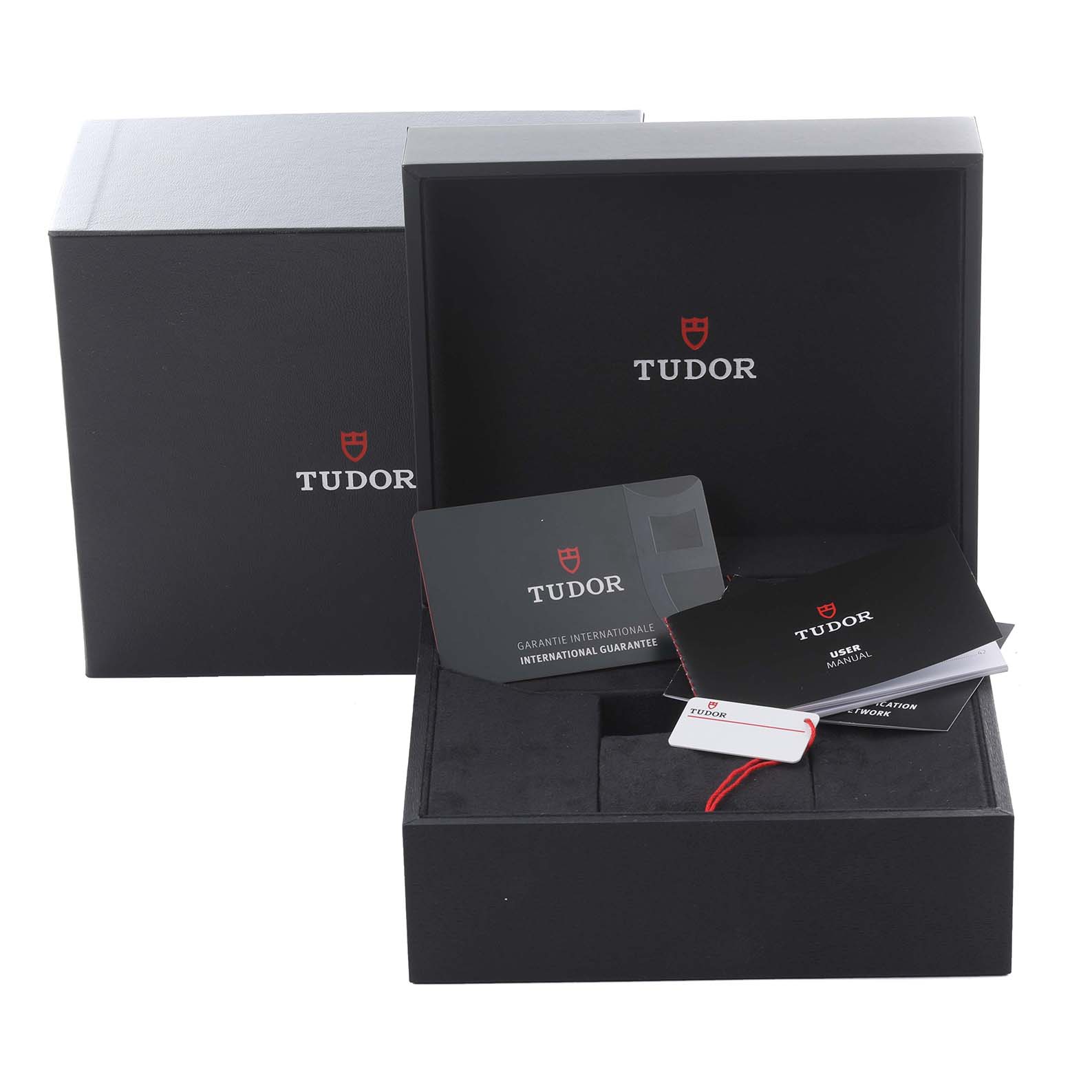The image shows the Tudor Heritage Black Bay 79030N Men's Stainless Steel Black Dial 79030N Men's Stainless Steel Black Dial packaging, warranty card, and user manual from a front angle.