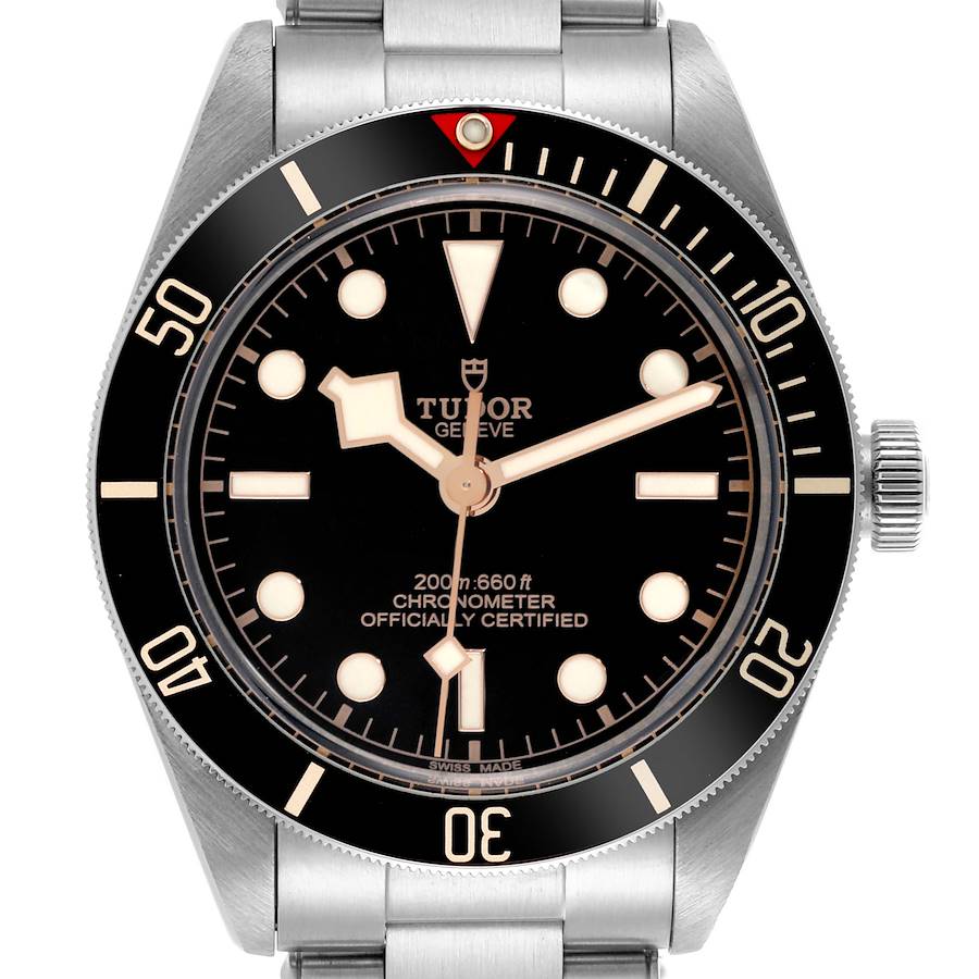 The Tudor Heritage Black Bay is shown from the front, highlighting the dial, bezel, and crown.