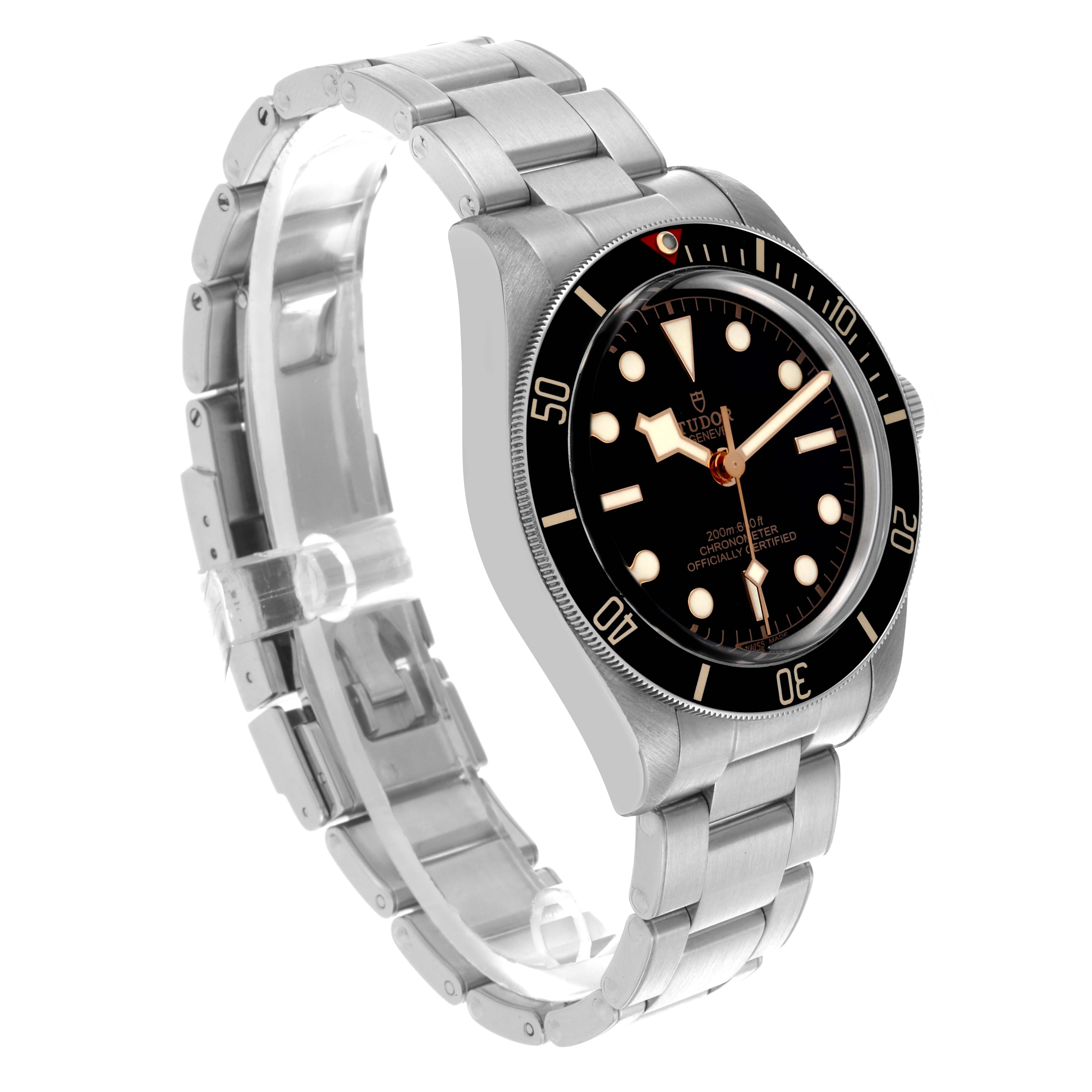 The Tudor Heritage Black Bay 79030N Men's Stainless Steel Black Dial 79030N Men's Stainless Steel Black Dial watch is shown at a slight angle, displaying the dial, bezel, and stainless steel bracelet.