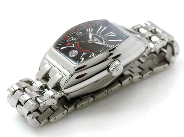 The image shows a Cintree Curvex model by Franck Muller at an angled side view, highlighting the crown and metal bracelet.