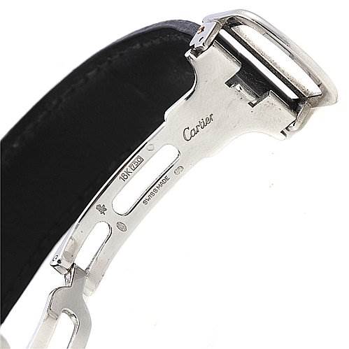 The image shows a close-up of the clasp and part of the leather strap of a Cartier Tank Obus 2380 White Gold Silver Dial 2380 White Gold Silver Dial watch, highlighting the "Cartier" engraving.