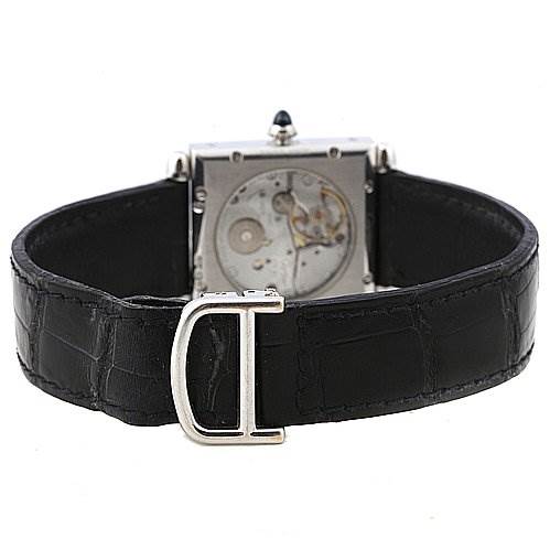 This image shows the back view of the Cartier Tank Obus 2380 White Gold Silver Dial 2380 White Gold Silver Dial watch, highlighting its movement and black leather strap.