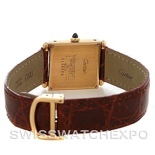 The image shows the back and strap of a Cartier Tank Obus Yellow Gold Silver Dial Yellow Gold Silver Dial watch, displaying its case back, leather strap, and buckle.