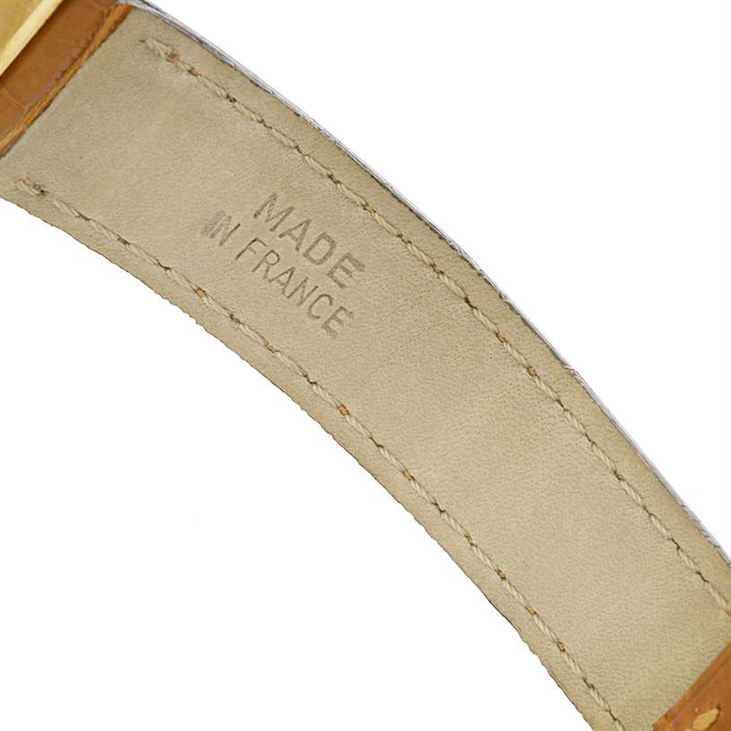 This image shows the inside of the strap with "Made in France" marking of a Cartier Tank Obus W1512256 Yellow Gold Silver Dial W1512256 Yellow Gold Silver Dial watch.