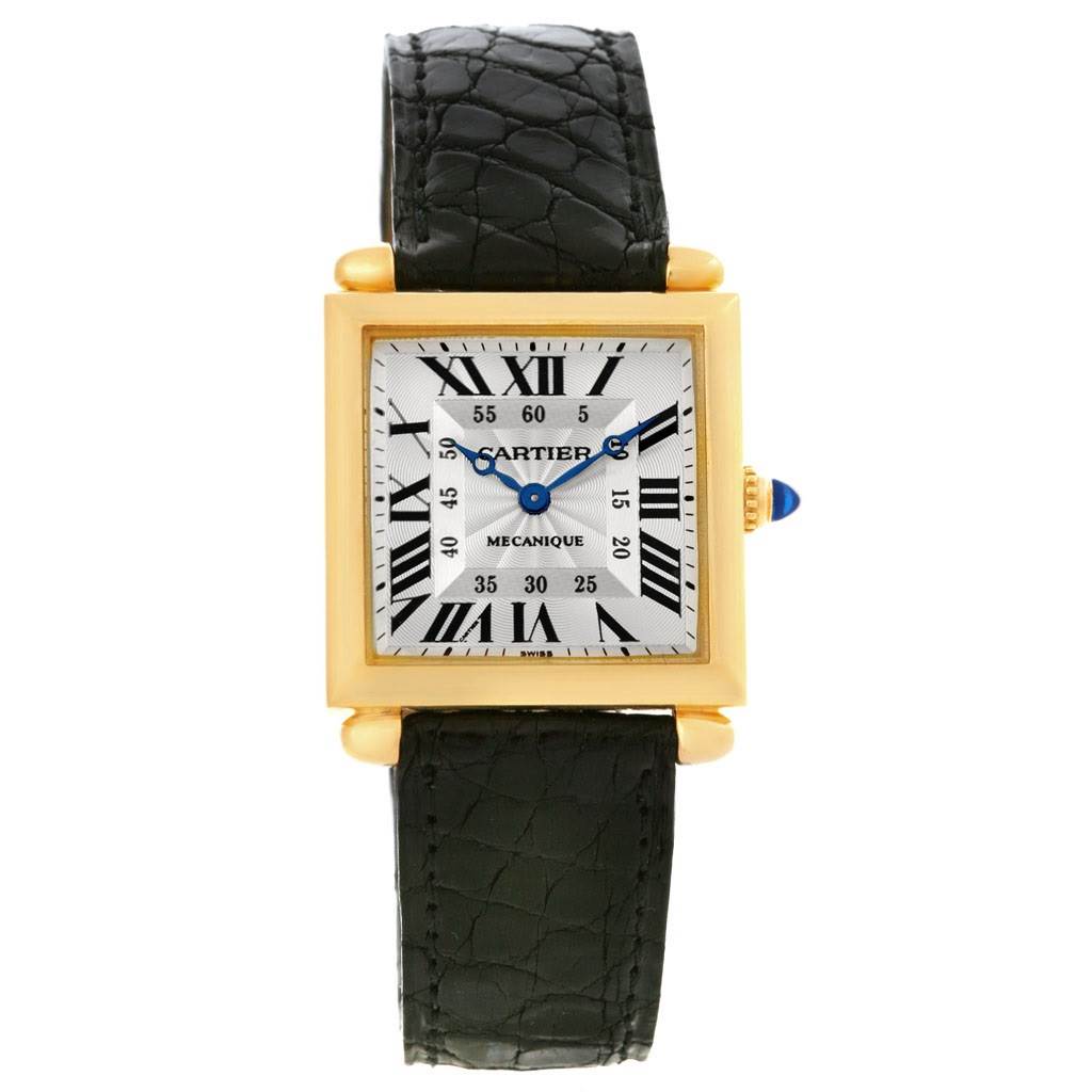 This is a front view of the Cartier Tank Obus W1527551 Men's Yellow Gold Silver Dial W1527551 Men's Yellow Gold Silver Dial watch, showing its square dial, Roman numerals, and leather strap.