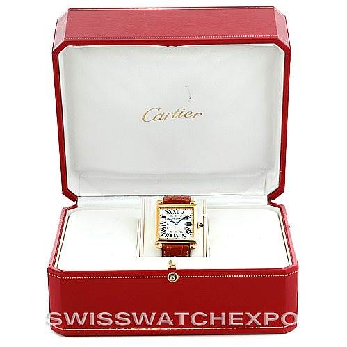 The image shows a Cartier Tank Obus W1527551 Men's Yellow Gold Silver Dial W1527551 Men's Yellow Gold Silver Dial watch displayed front-facing inside an open red Cartier box.