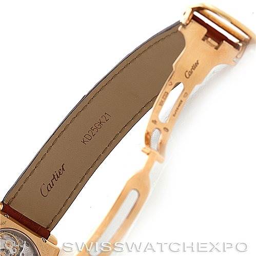 The image shows the underside of the strap and clasp of a Cartier Tank Obus W1527551 Men's Yellow Gold Silver Dial W1527551 Men's Yellow Gold Silver Dial watch, displaying the brand name and model details.