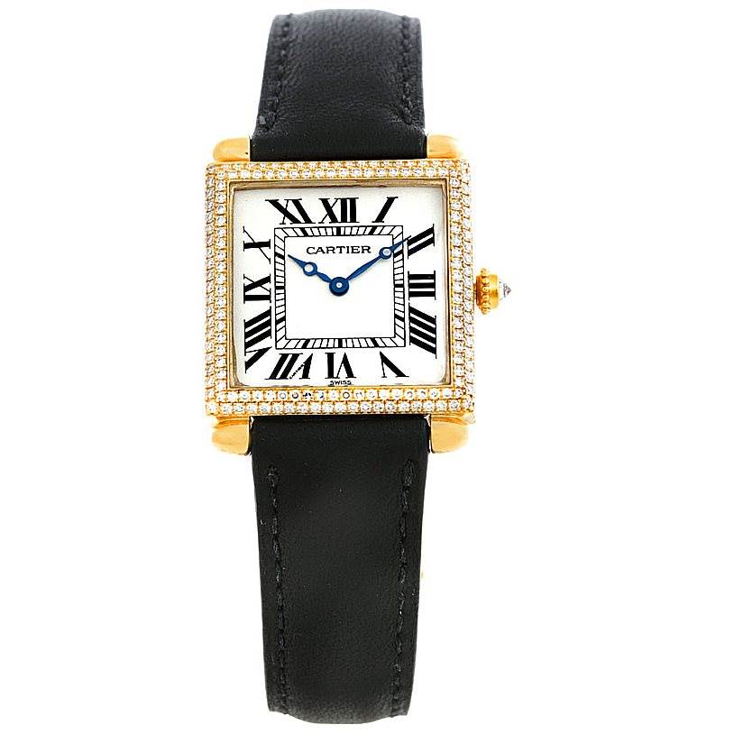 The image shows a front view of a Cartier Tank Obus W1512256 Men's Yellow Gold Silver Dial W1512256 Men's Yellow Gold Silver Dial watch, featuring a gold case, diamond bezel, Roman numerals, and black leather strap.