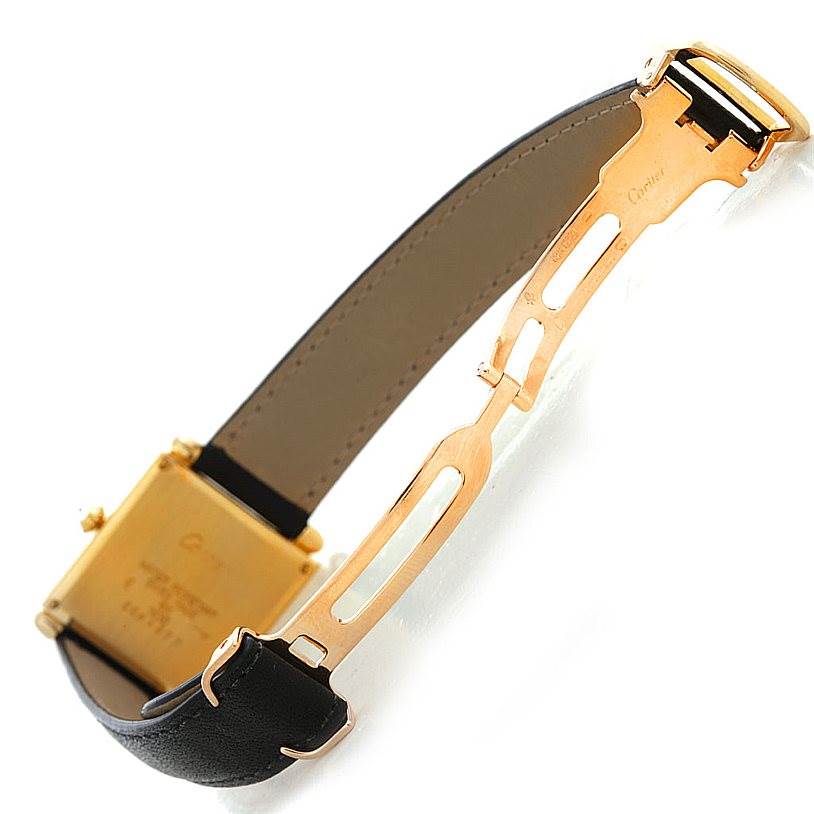 The image shows the back and partially open clasp of a Cartier Tank Obus W1512256 Men's Yellow Gold Silver Dial W1512256 Men's Yellow Gold Silver Dial watch, highlighting the strap and buckle.