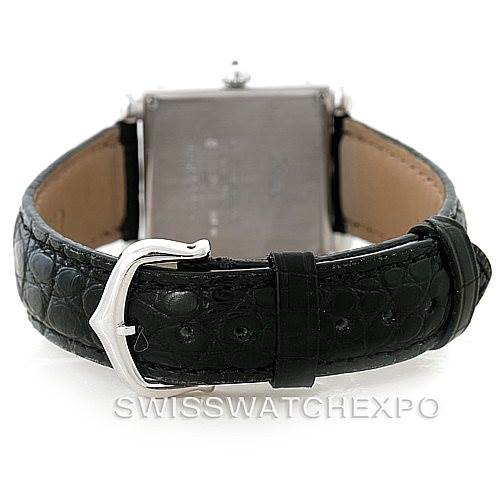 The image shows the back of the Cartier Tank Obus Men's White Gold Silver Dial Men's White Gold Silver Dial watch, displaying its leather strap and buckle.