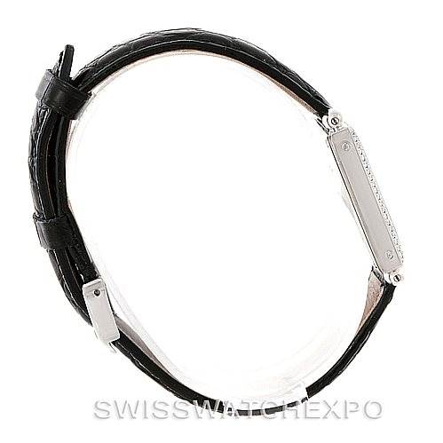 This image shows a Cartier Tank Obus Men's White Gold Silver Dial Men's White Gold Silver Dial watch in a side profile, highlighting the strap and the thin rectangular case.