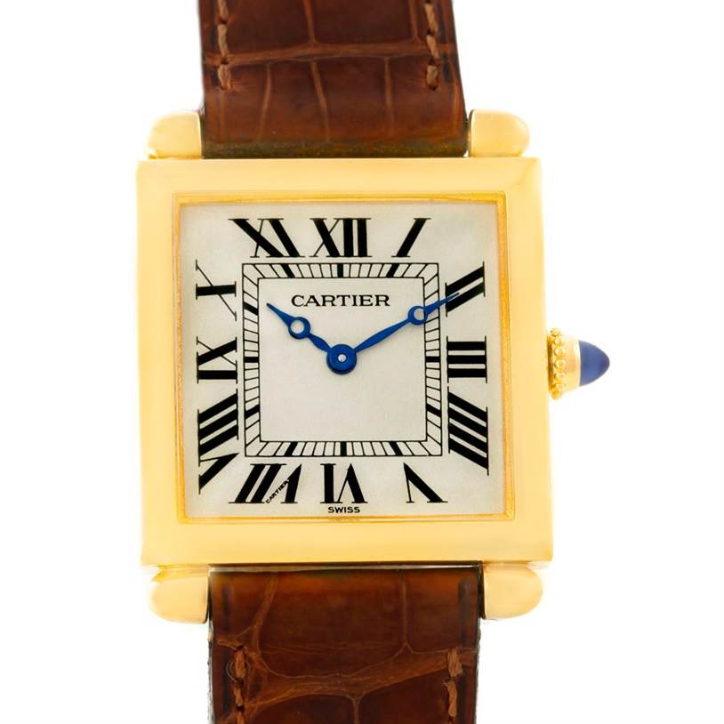 This image shows the Cartier Tank Obus 1630 Men's Yellow Gold Silver Dial 1630 Men's Yellow Gold Silver Dial watch from a front angle, displaying its dial, hands, case, and leather strap.