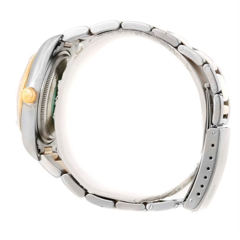 The image shows a side view of the Rolex Oyster Perpetual 14233 Men's Steel and Gold (two tone) Grey Dial 14233 Men's Steel and Gold (two tone) Grey Dial, highlighting the crown, bezel, and bracelet from a profile perspective.